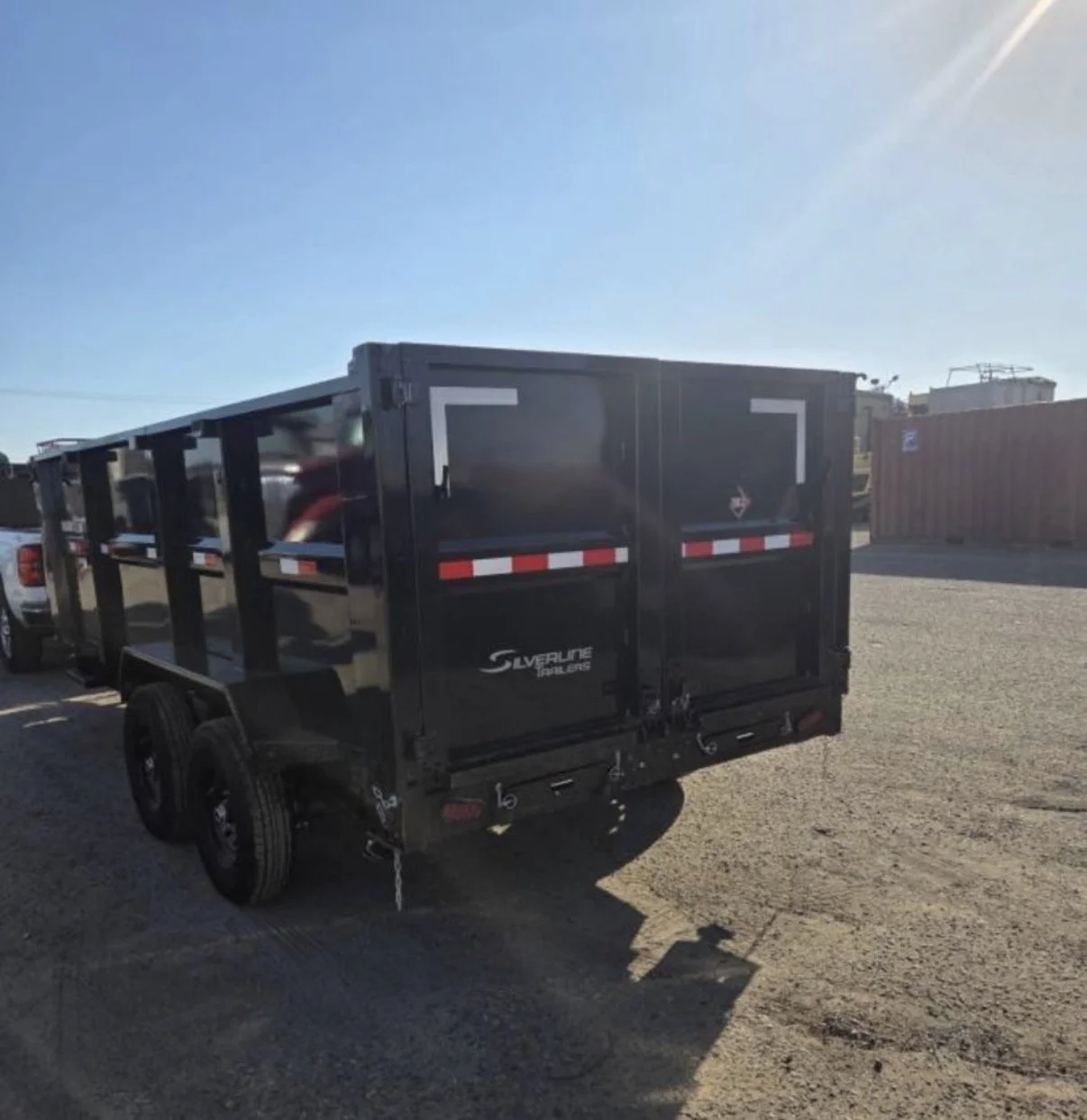 2026 ED dump trailer, rear view showing tailgate and trailer body.