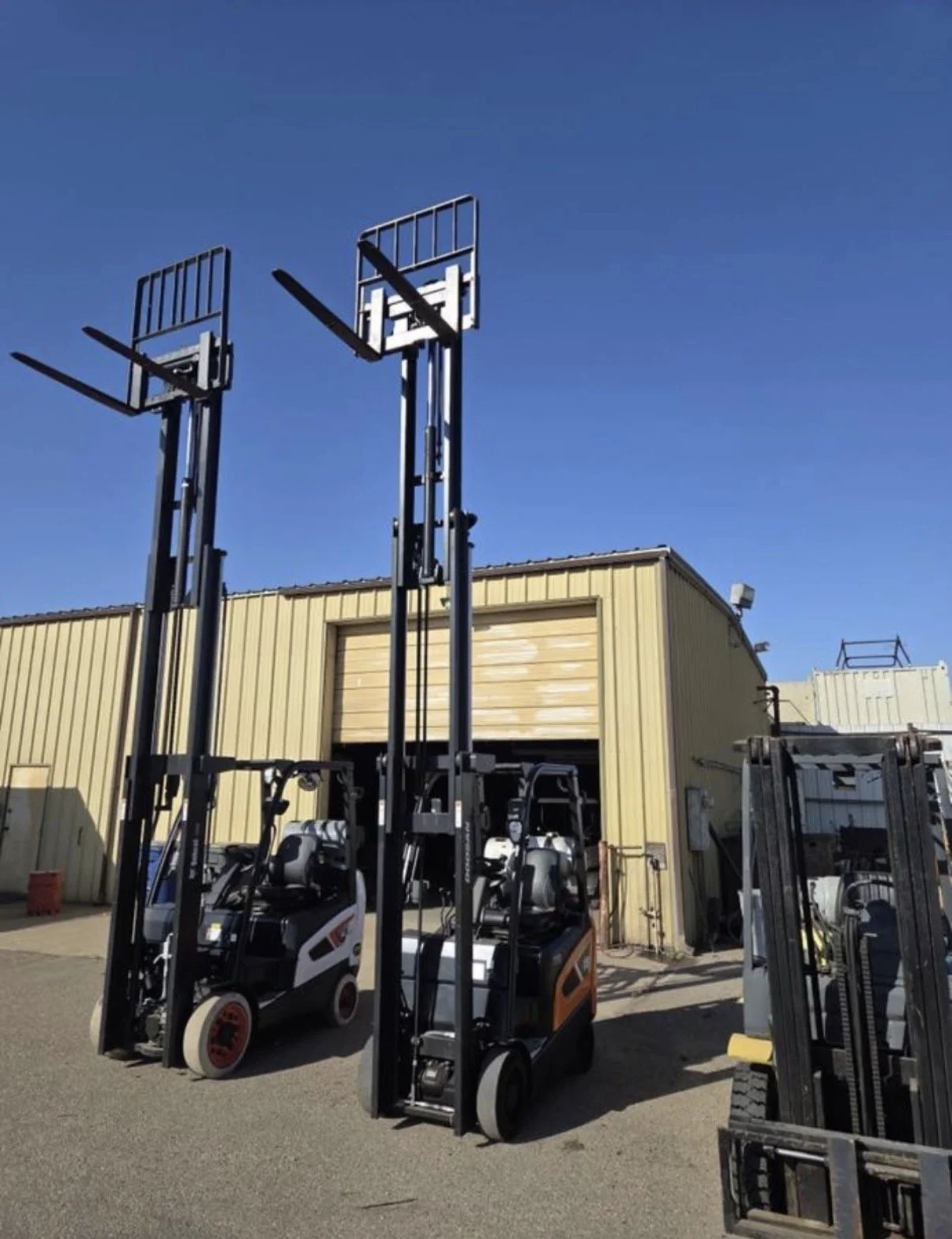 2021 Doosan GC18S-9 forklift, front view showing lifting mast and overhead guard.