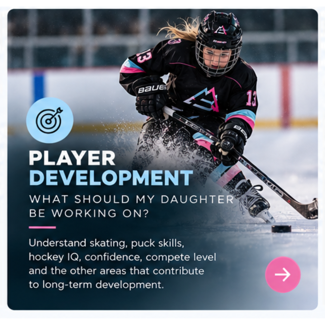 A young female hockey player in a black uniform with pink and blue accents playing hockey on ice, skating forward with a stick and puck, wearing a helmet with a face cage.