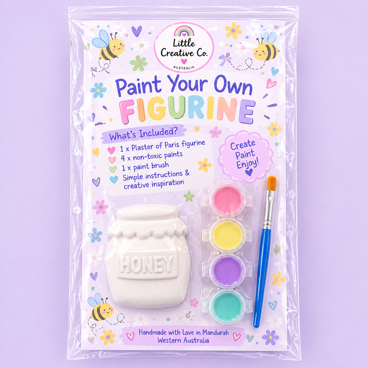 A children's DIY painting kit called "Paint Your Own Figurine" by Little Creative Co. Australia. Includes a plaster honey jar figurine, four non-toxic paints, a paintbrush, and simple instructions. The packaging features colorful flowers, hearts, and bees.