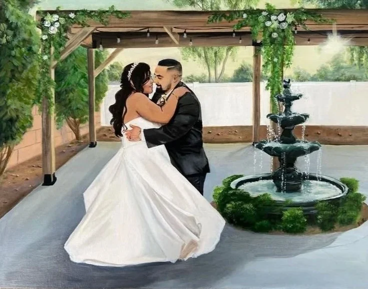 Bride and groom dancing outdoors under a wooden pergola decorated with greenery and white flowers, with a multi-tiered fountain nearby.