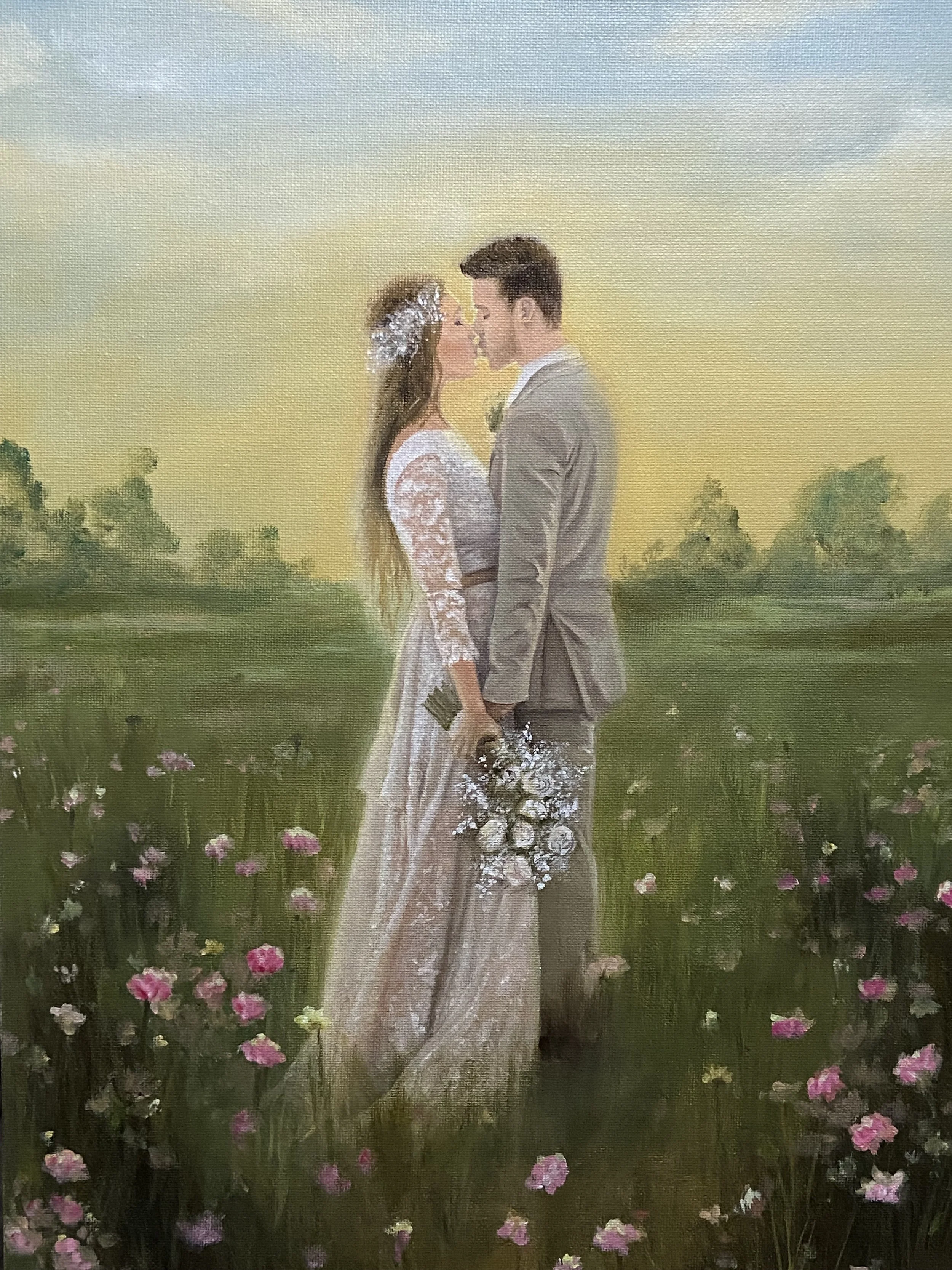 A painting of a bride and groom standing close together on a green field filled with pink flowers, with a sunset sky in the background.