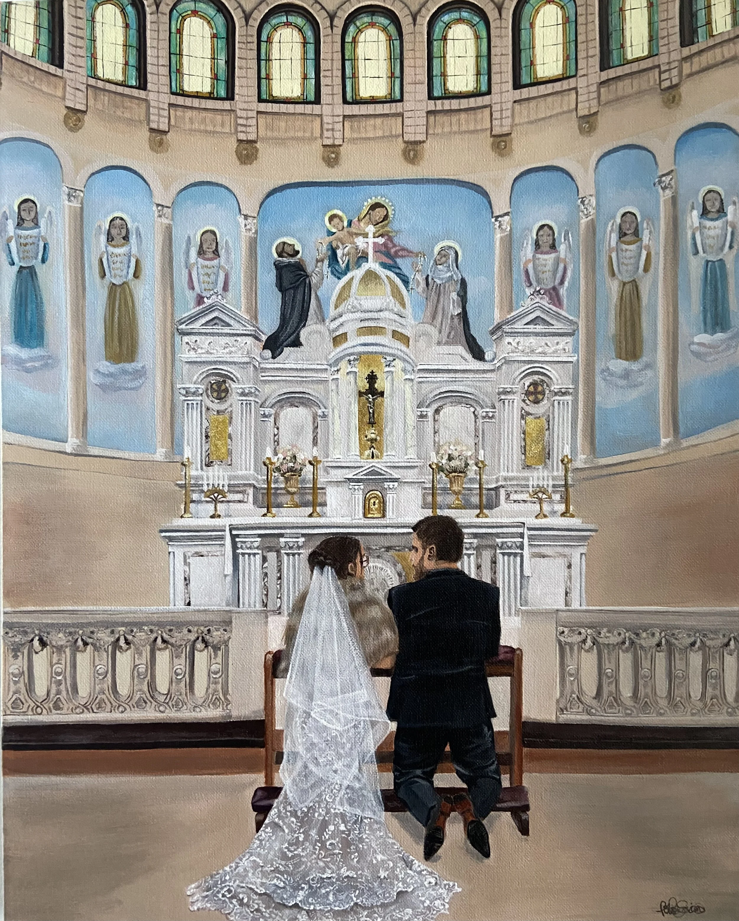 A bride and groom kneeling in front of an altar inside a church during their wedding ceremony. The altar is ornately decorated with statues, candles, and religious symbols, and features a large painting or mural of religious figures on the wall behind it. The bride is wearing a white wedding dress with a long train, while the groom is dressed in a dark suit. Two women are visible in the foreground, facing the altar. The church interior features stained glass windows and architectural details.