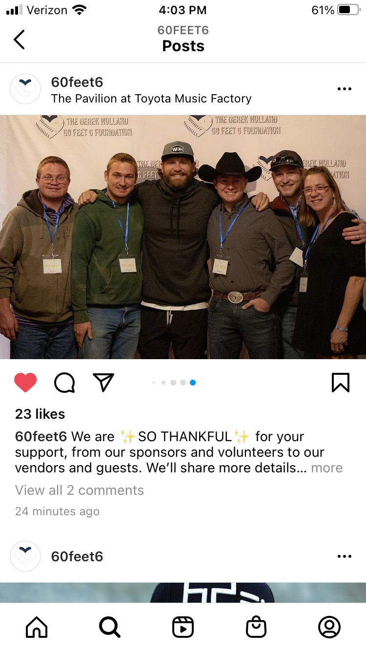 Group photo of six people standing in front of a backdrop with the logo of the Derek Holland 60 Feet Foundation, smiling and posing together.