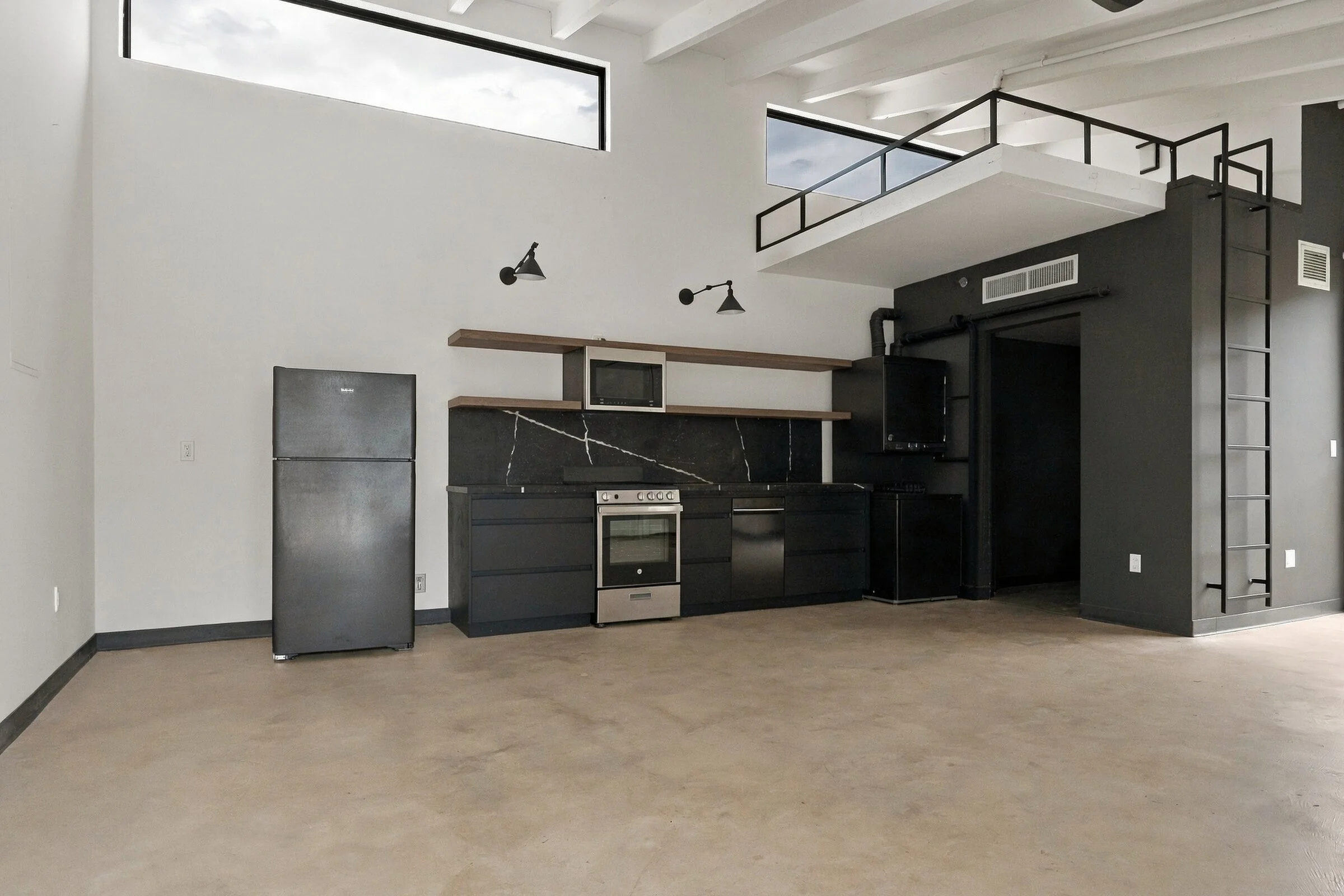 An empty loft before virtual staging