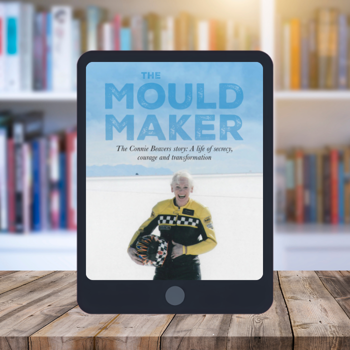 Kindle type devive showing the cover of the book The Mould Maker. Bookshelf background