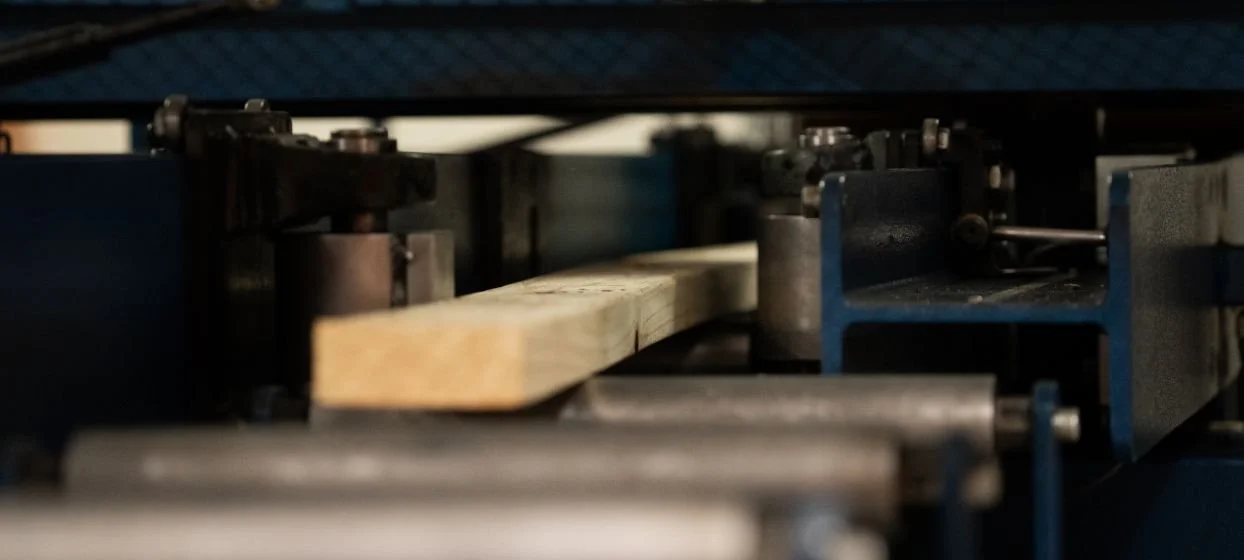 Australian Kiln Dried framing timber being graded through the manufacturers conveyor system