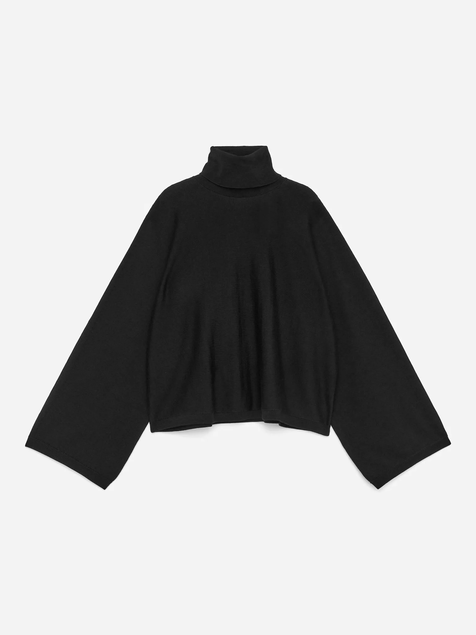 Roll neck merino jumper in black 
