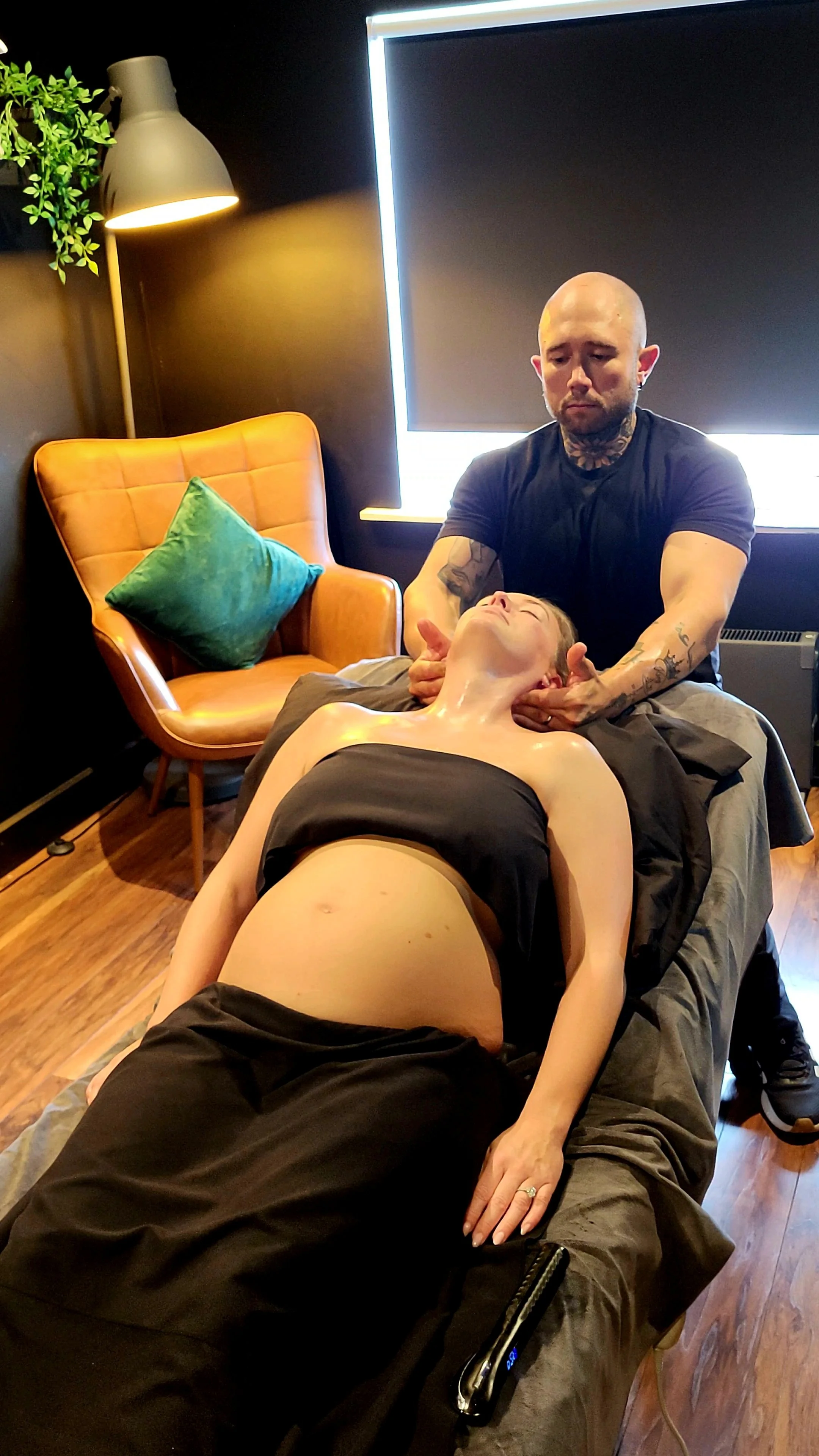 Pregnancy remedial massage at The Recovery Room in Portadown, helping ease back, hip and muscular tension during pregnancy.
