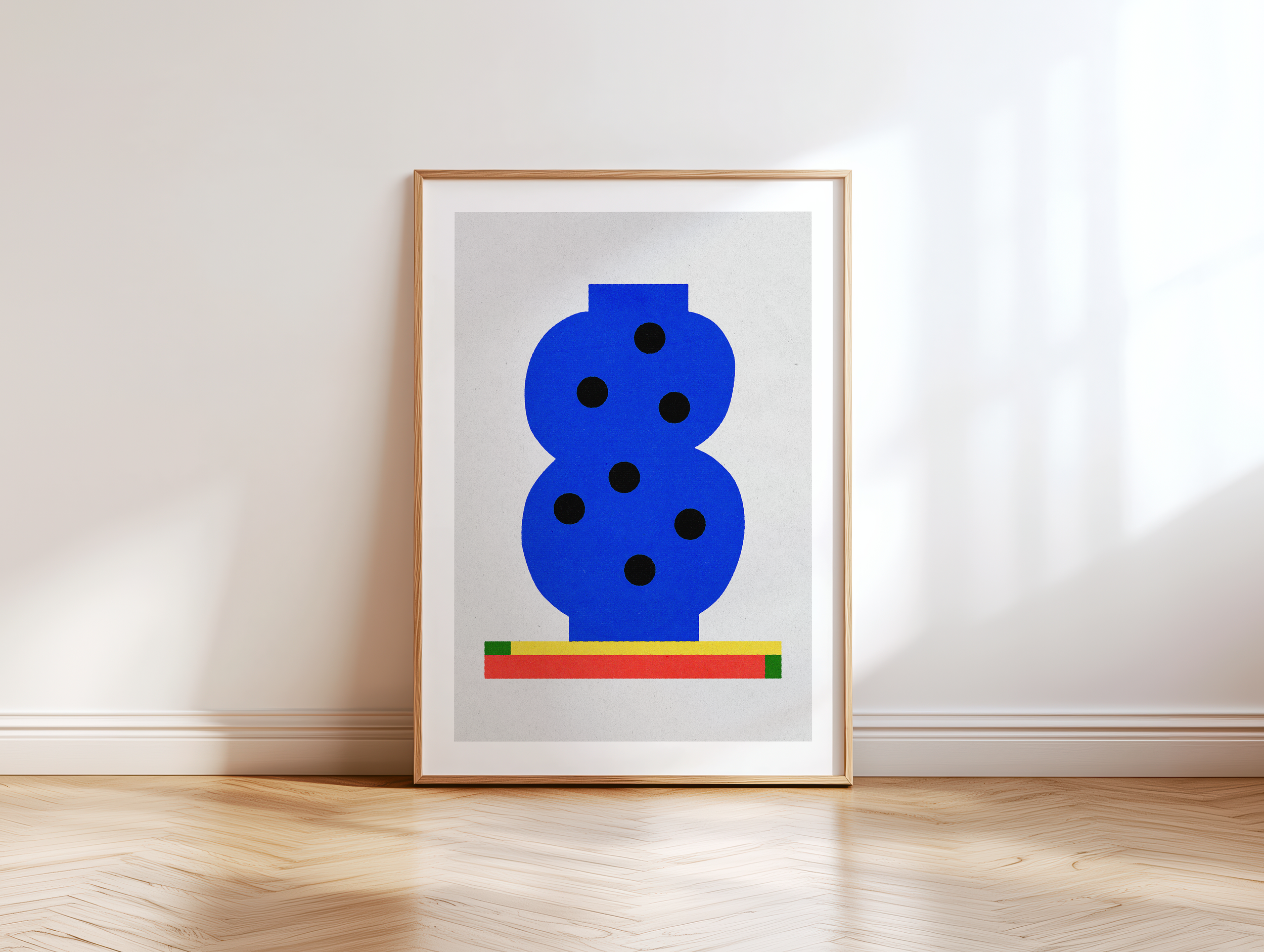 Framed abstract blue bowling pin artwork with black dots and colorful red, yellow, and green stripes