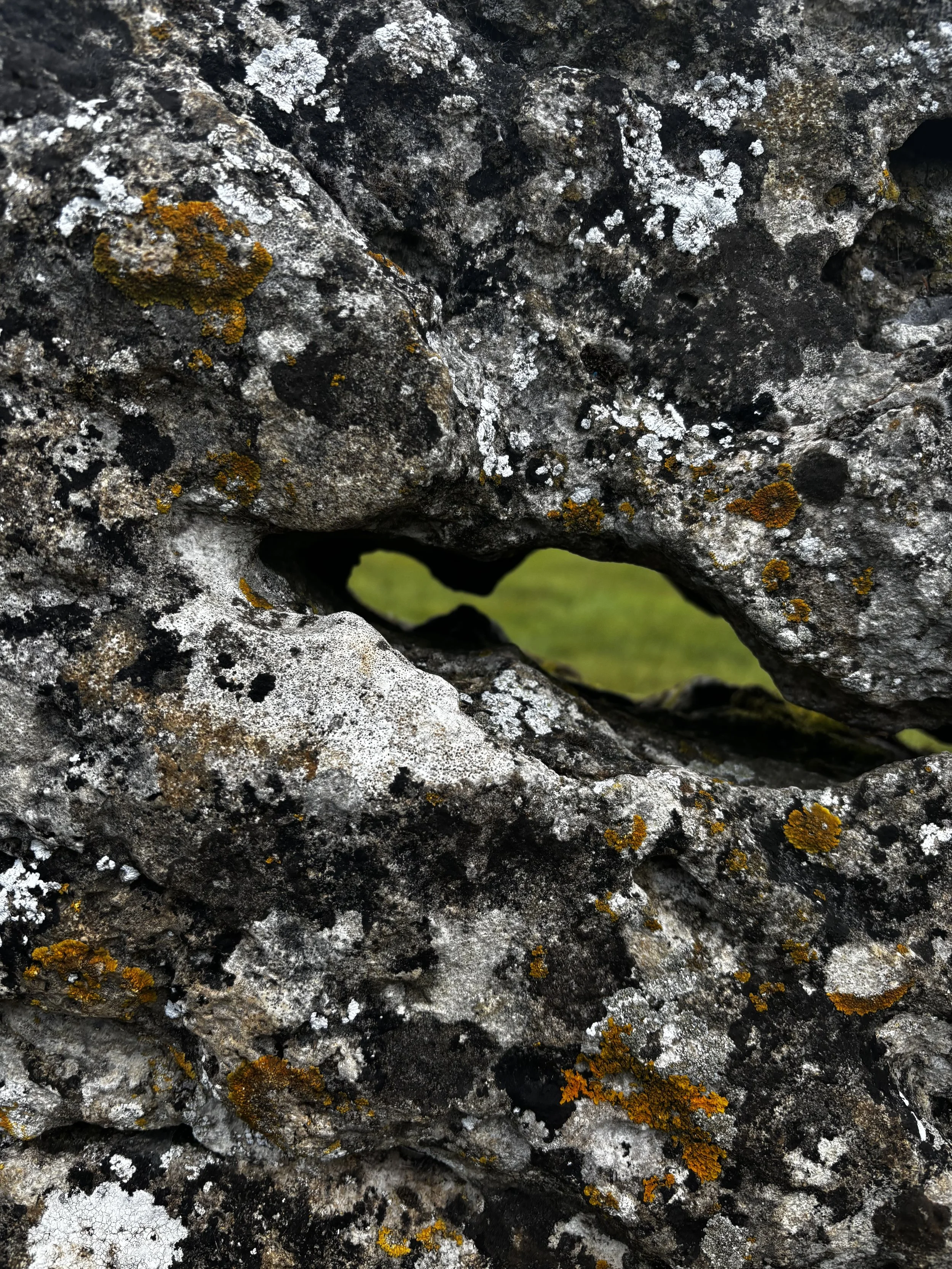 A hole in a rollright stone representing liminality