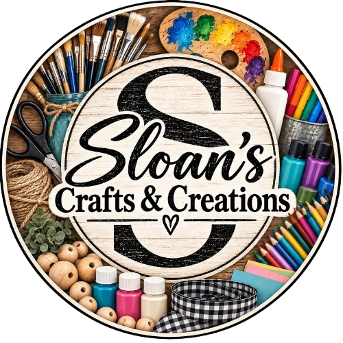 A circular craft logo with a wooden background, featuring various art supplies like paintbrushes, paint pallets, glue, colored markers, scissors, yarn, beads, and washi tape surrounding a central sign that reads "Sloan's Crafts & Creations."