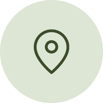 A location pin icon on a light green background.