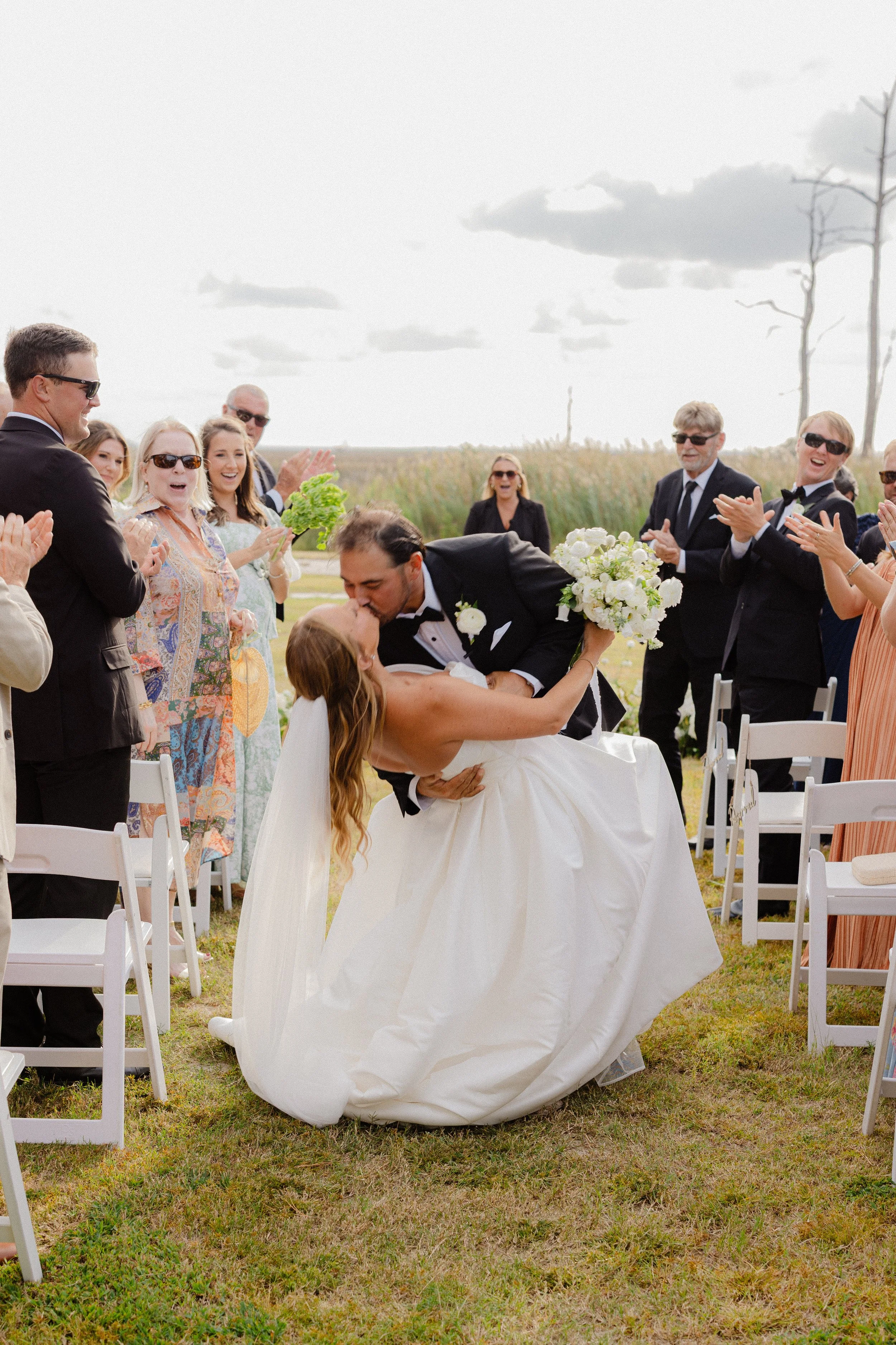 Groom kissing bride