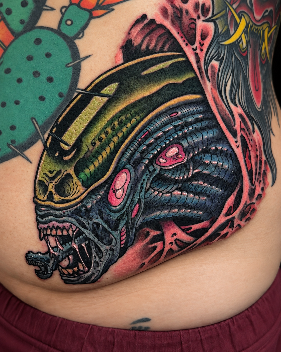Color Xenomorph alien tattoo with biomechanical details by Miami tattoo artist Adrian Aguirre