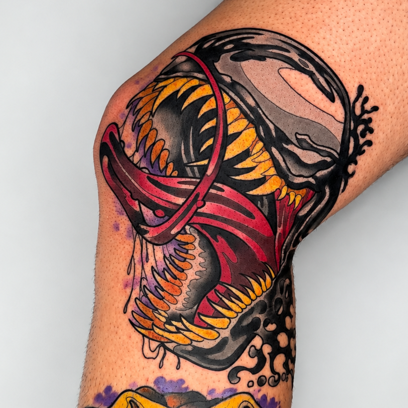 Color Venom tattoo with open mouth and teeth by Miami tattoo artist Adrian Aguirre