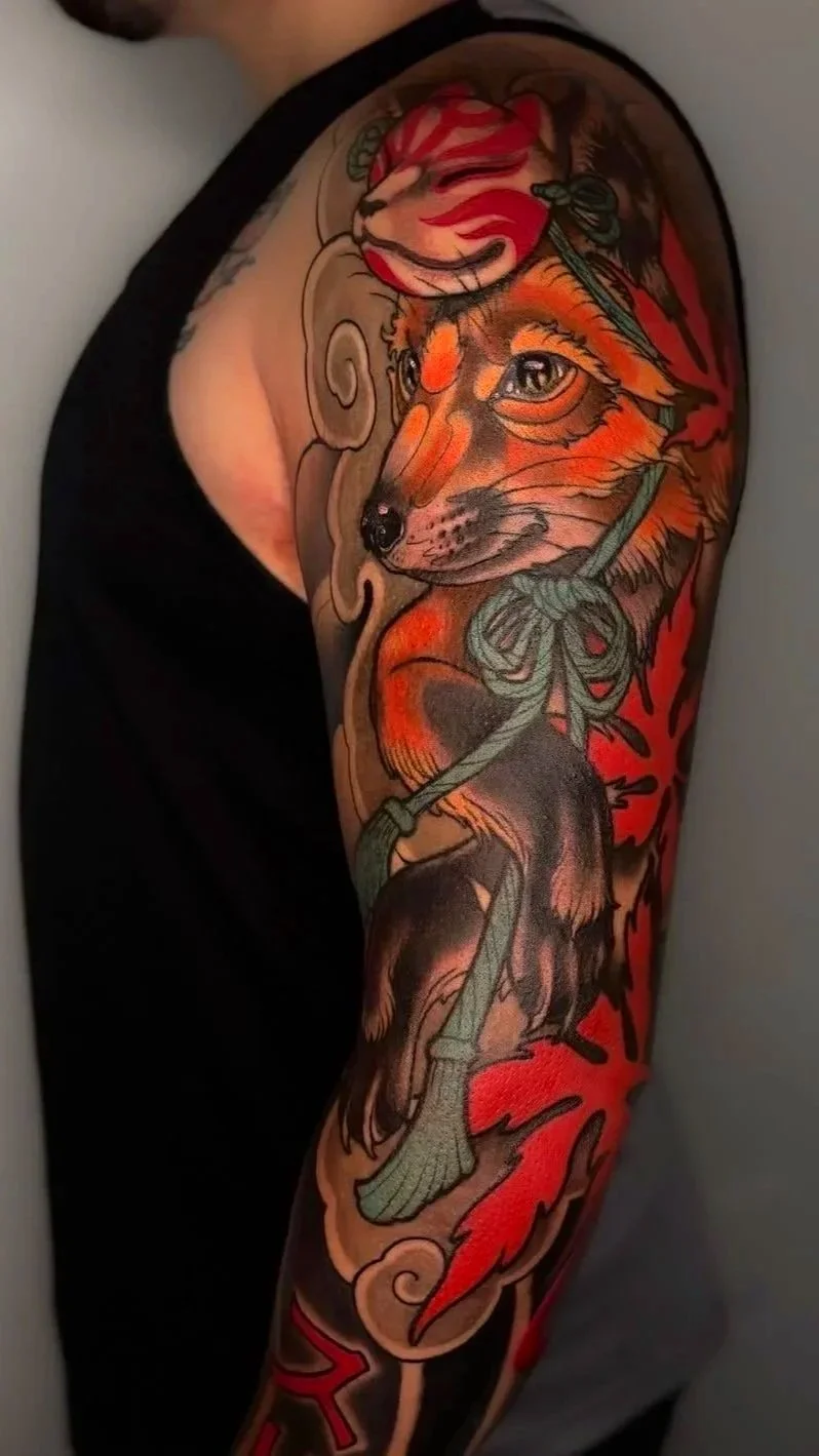 Neo-Japanese kitsune fox tattoo with decorative mask and red accents by Miami tattoo artist Adrian Aguirre