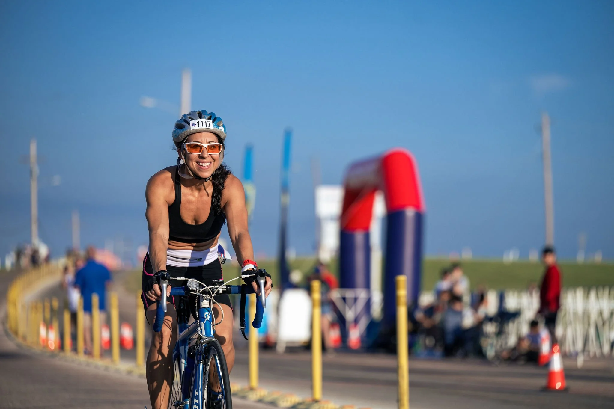 Cyclist smiling on the race course