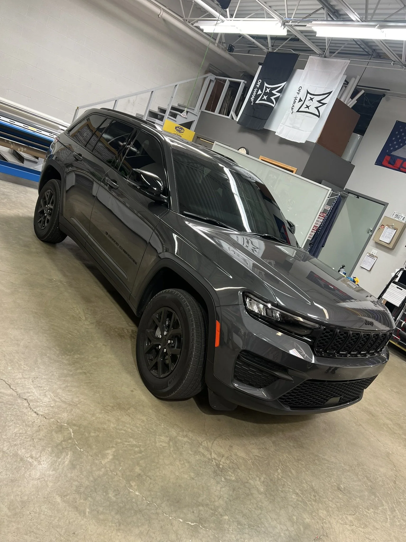 Dark gray SUV with paint protection film installed at the Element Graphics shop