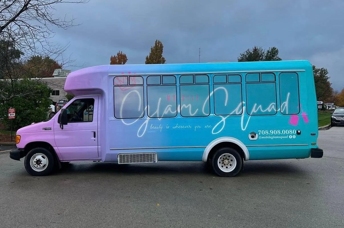 Purple and teal gradient wrap on the Mobile Glam Squad shuttle bus