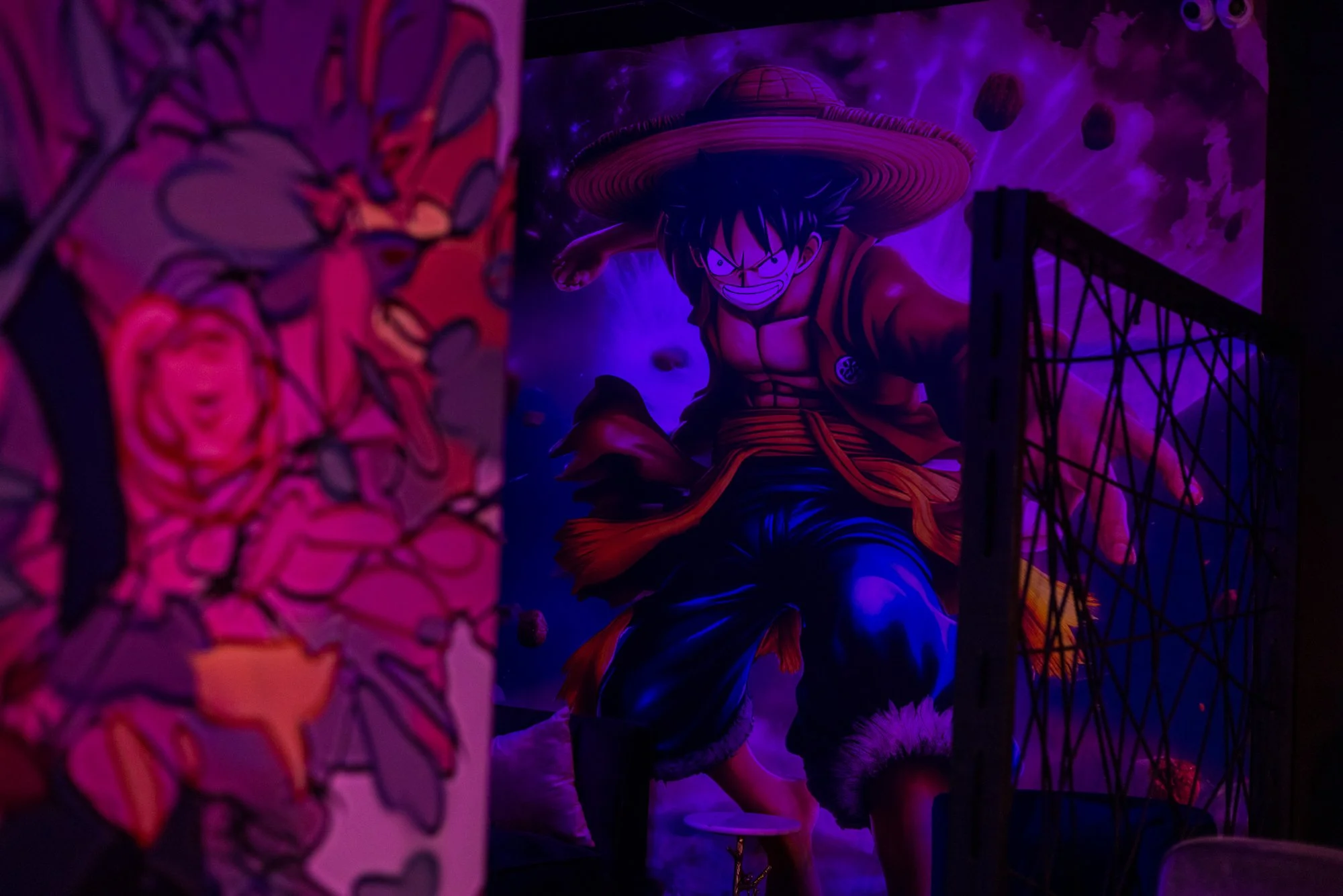 Poster of Monkey D. Luffy from One Piece, wearing a straw hat and in an action pose.