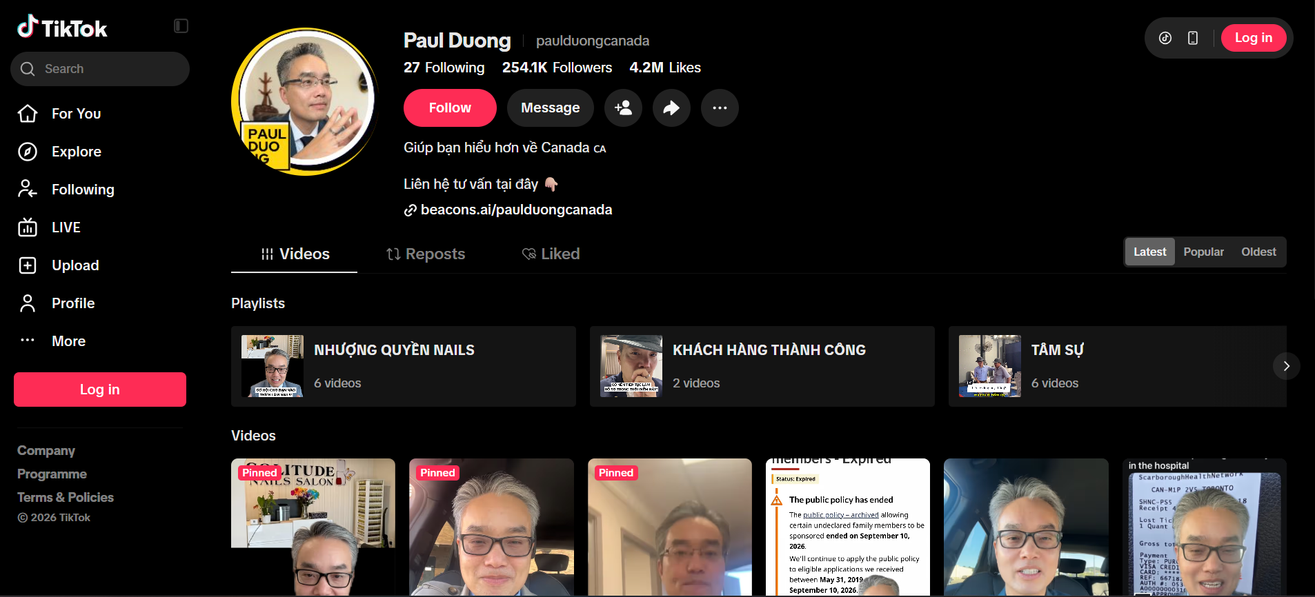 Screenshot of TikTok profile page of Paul Duong, a man with glasses in a suit, with videos and subscriptions, visible on a dark mode interface.