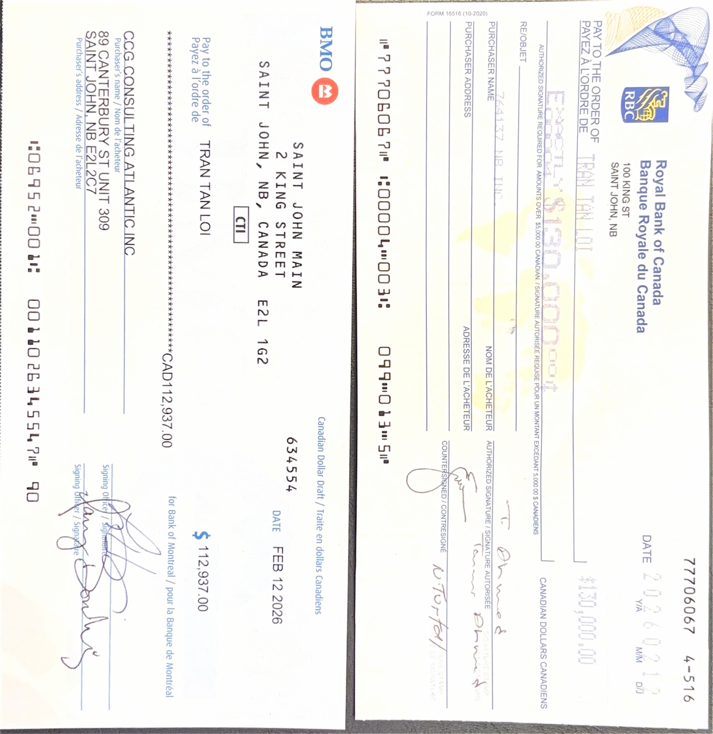 A photograph of a check with details filled out and signatures at the bottom.