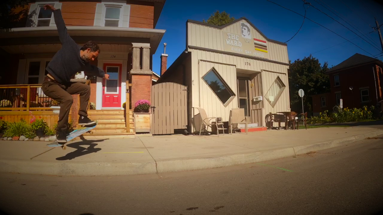 A Rad Dad (still from the film). Man doing a trick on a skateboard in Guelph, ON.