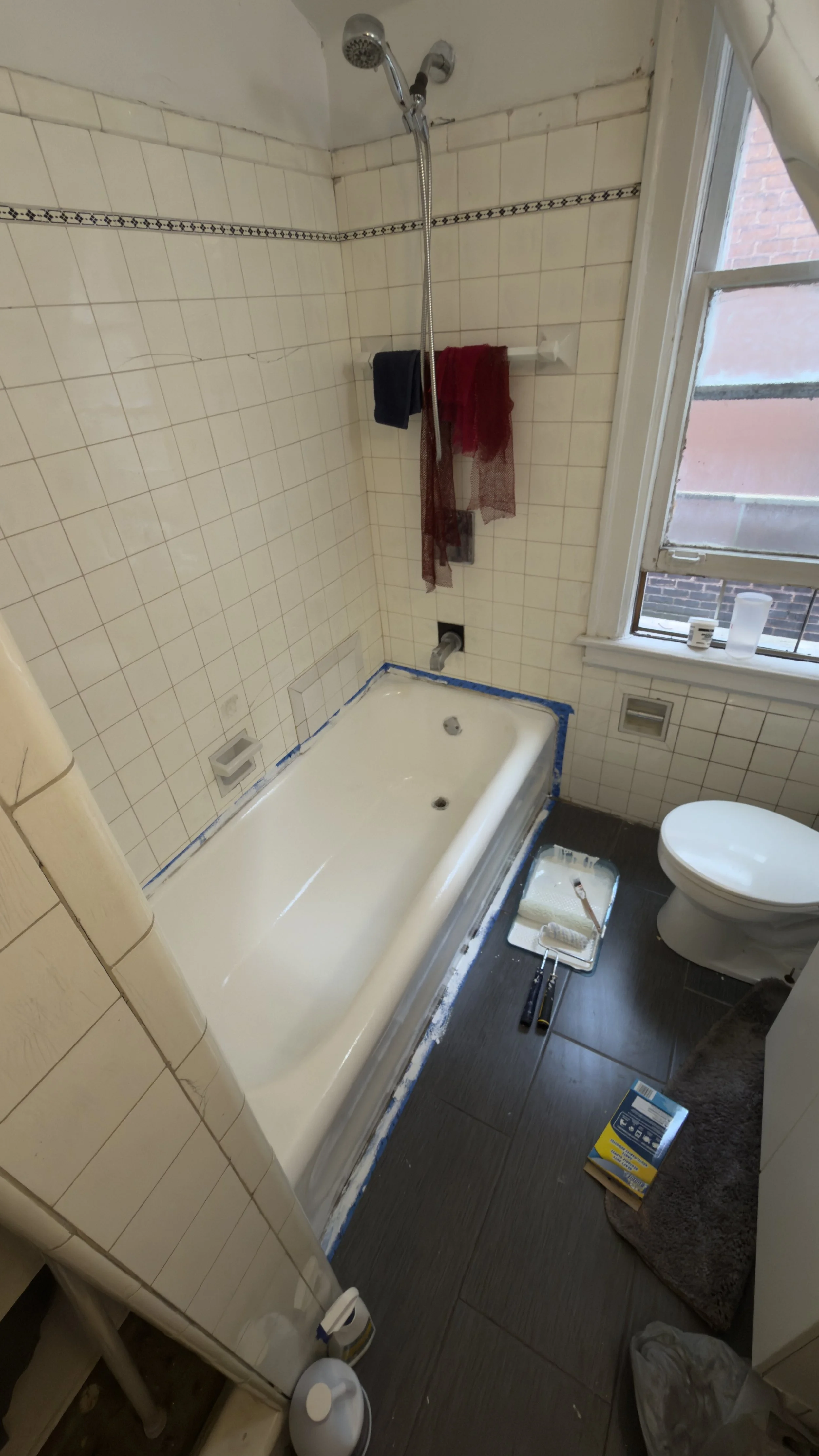 Bathroom renovation and maintenance work in progress in a residential property.