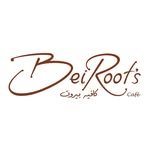 Dei Roots Coffee logo with cursive text