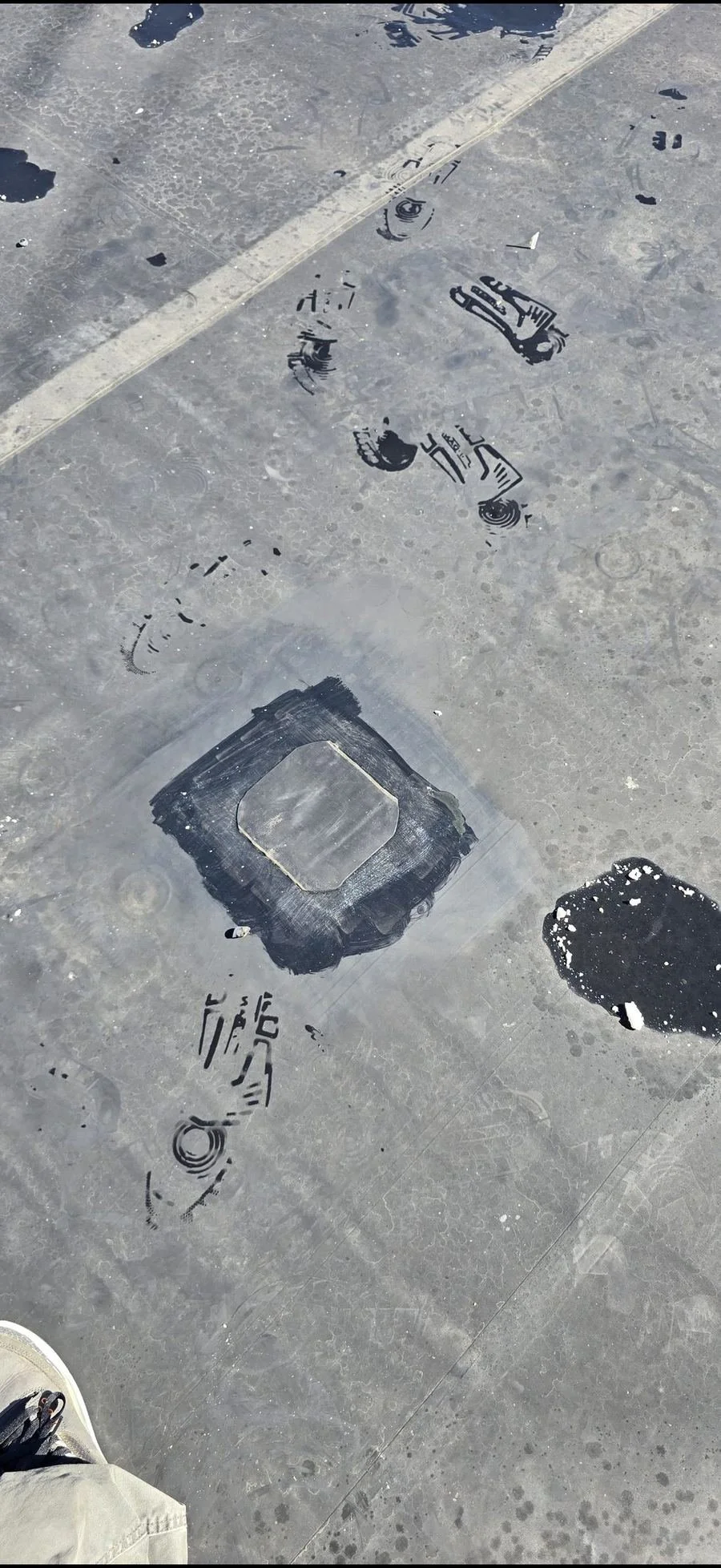 After: the EPDM rubber roof membrane patched and sealed