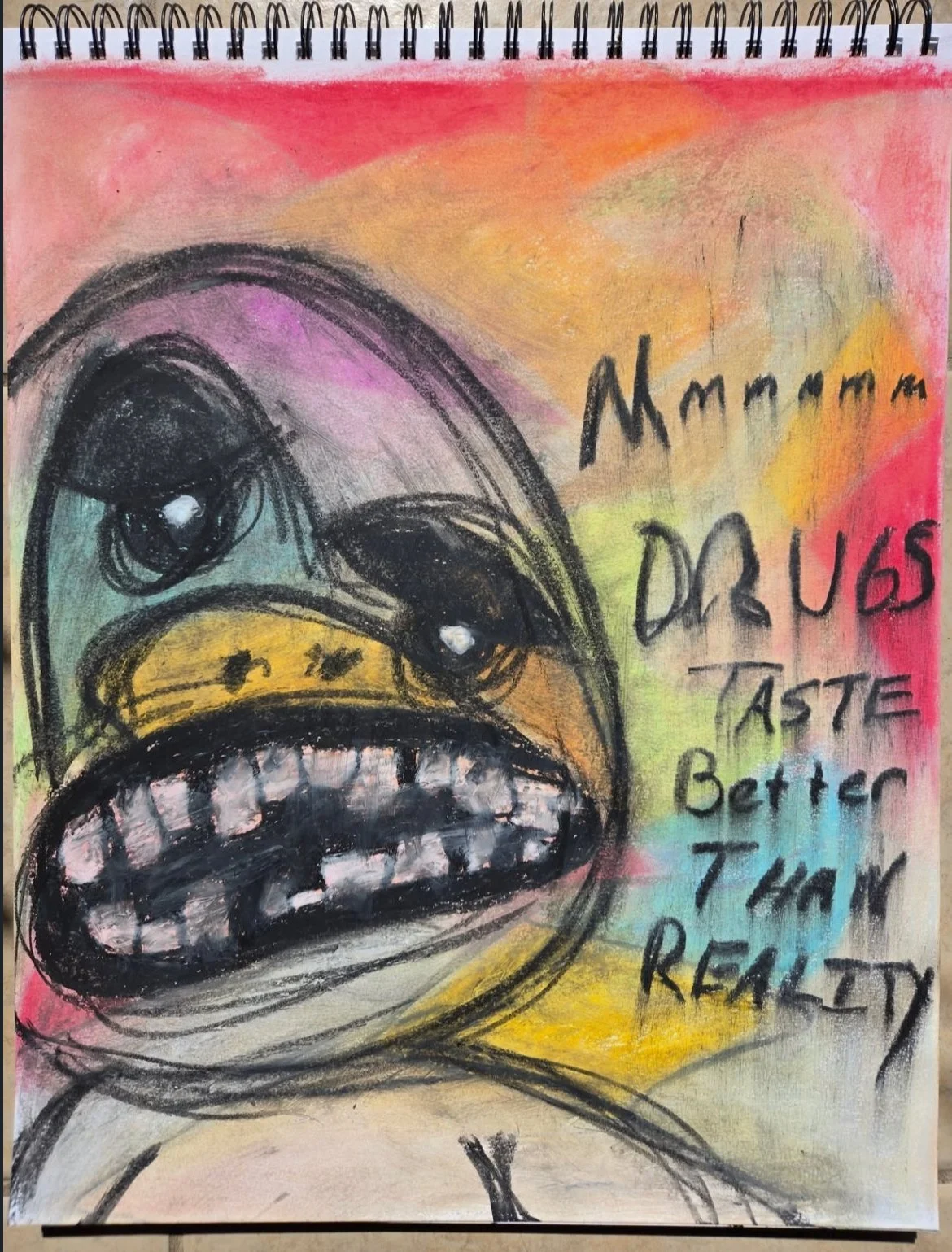 A colorful, abstract drawing of a face with exaggerated features and large eyes, with the text "Mmm... DUBS TASTE Better THAN REALITY" written beside it.
