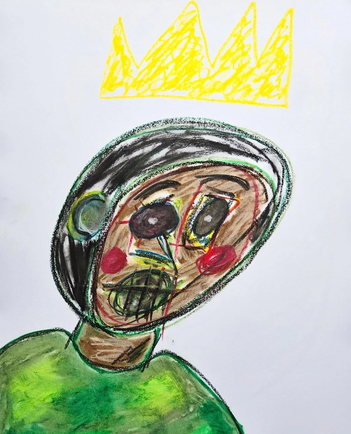 Child's drawing of a face with large black eyes, red cheeks, and a distorted mouth, wearing a green shirt, with yellow crown above.