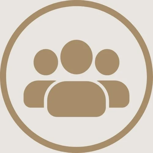 Icon of four people inside a circle, representing a group or community.