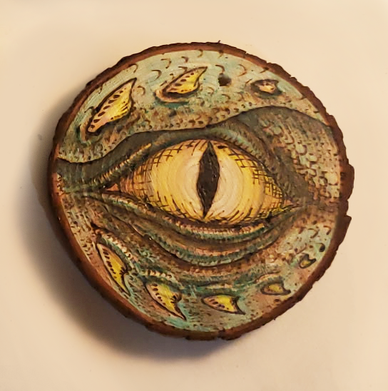 Wooden Serpent Eye Ornament