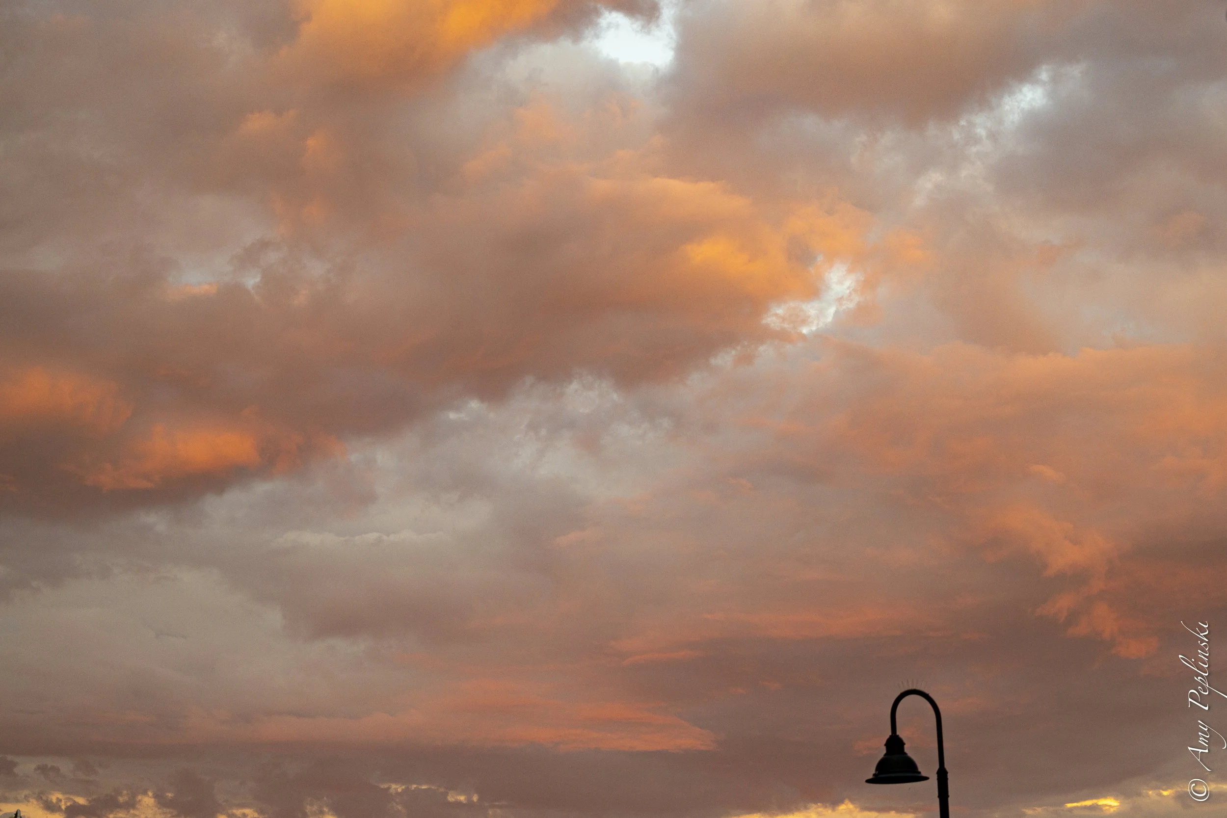 clouds over Pioneer Street