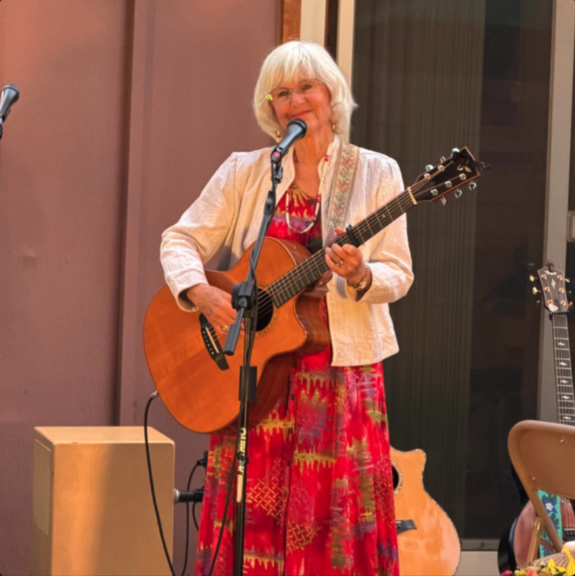 SusanPerformStandingGuitar.png