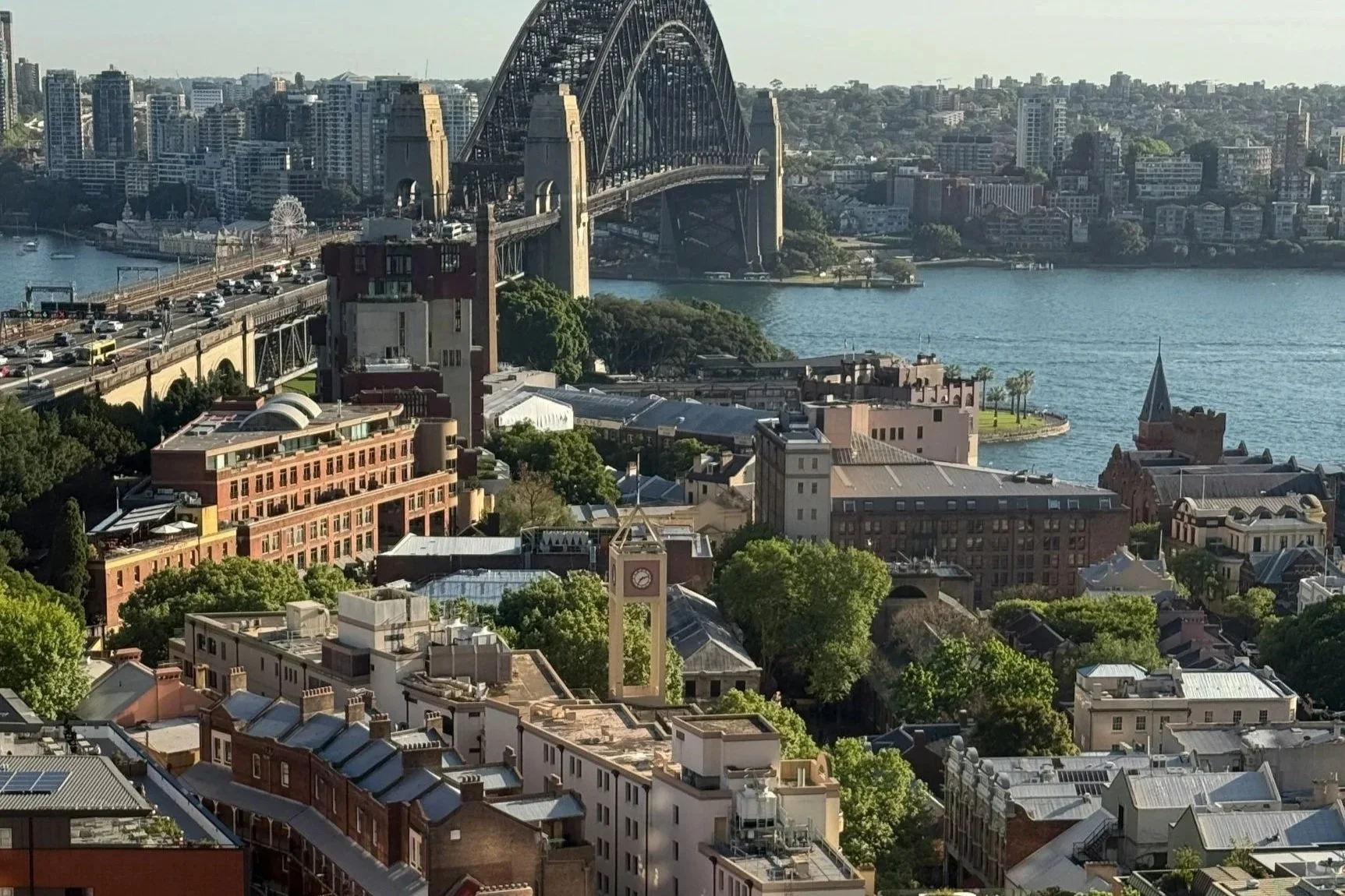 Aerial view of Sydney Harbour Bridge, Circular Quay, and Sydney city skyline
