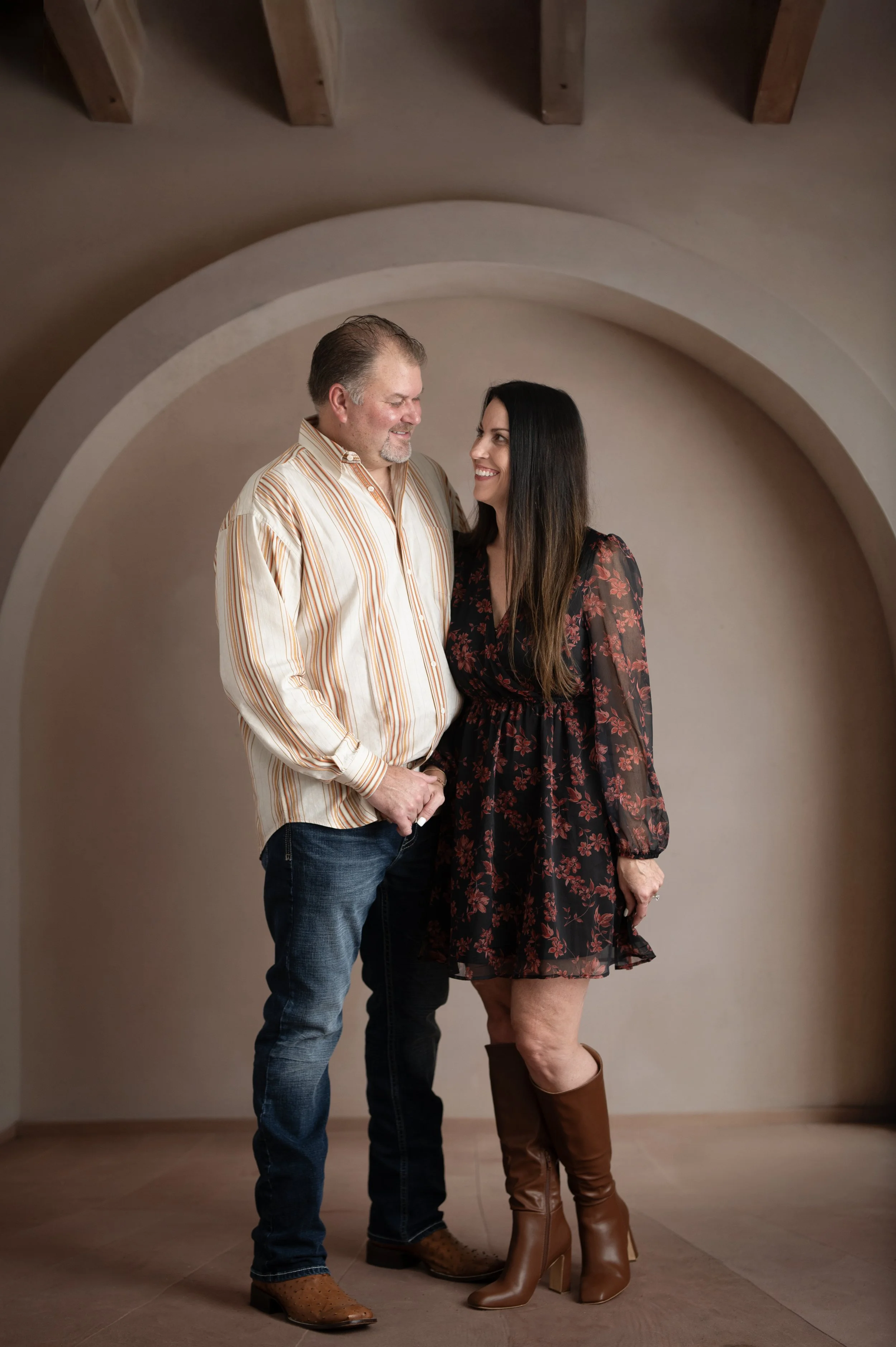 Couple smiling together during a studio couples portrait session in Millersville, Maryland.
