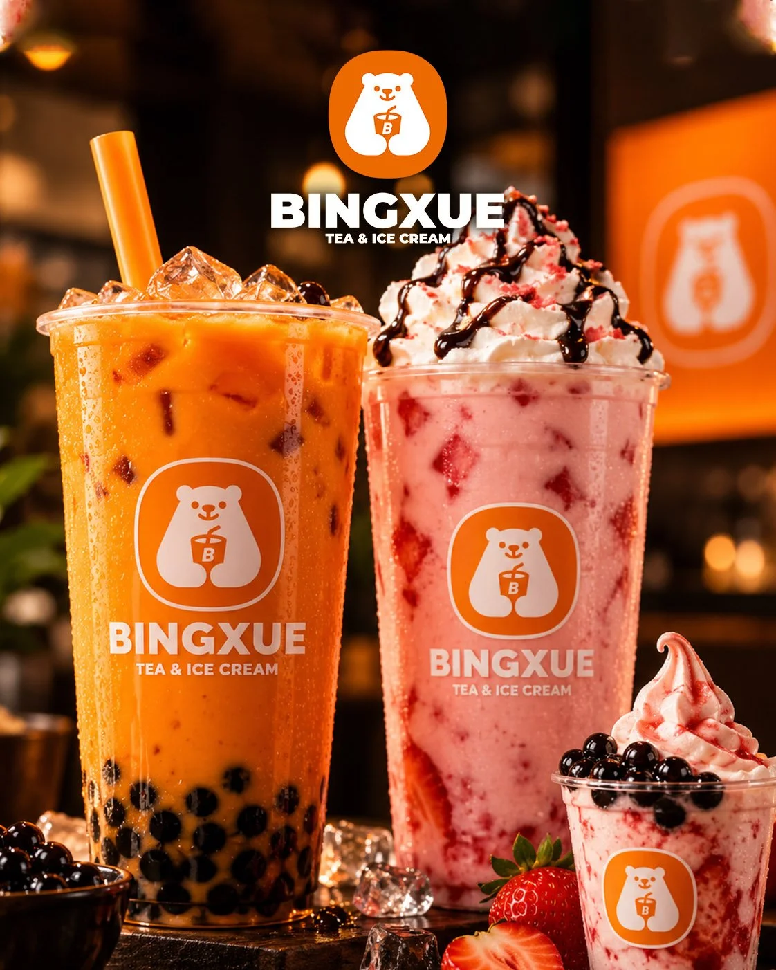 Three cups of bubble tea from Bingxue Tea & Ice Cream with tapioca pearls, whipped cream, and toppings, set on a dark table with strawberries and ice cubes.