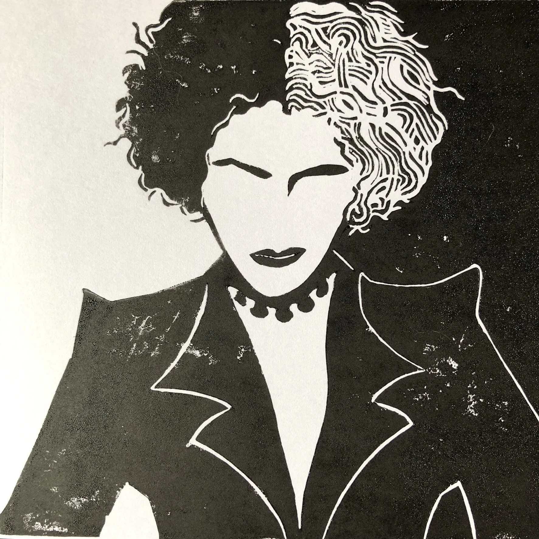 Black and white stencil-style image of a woman with curly hair, lipstick, wearing a shirt with a collar and large earrings.