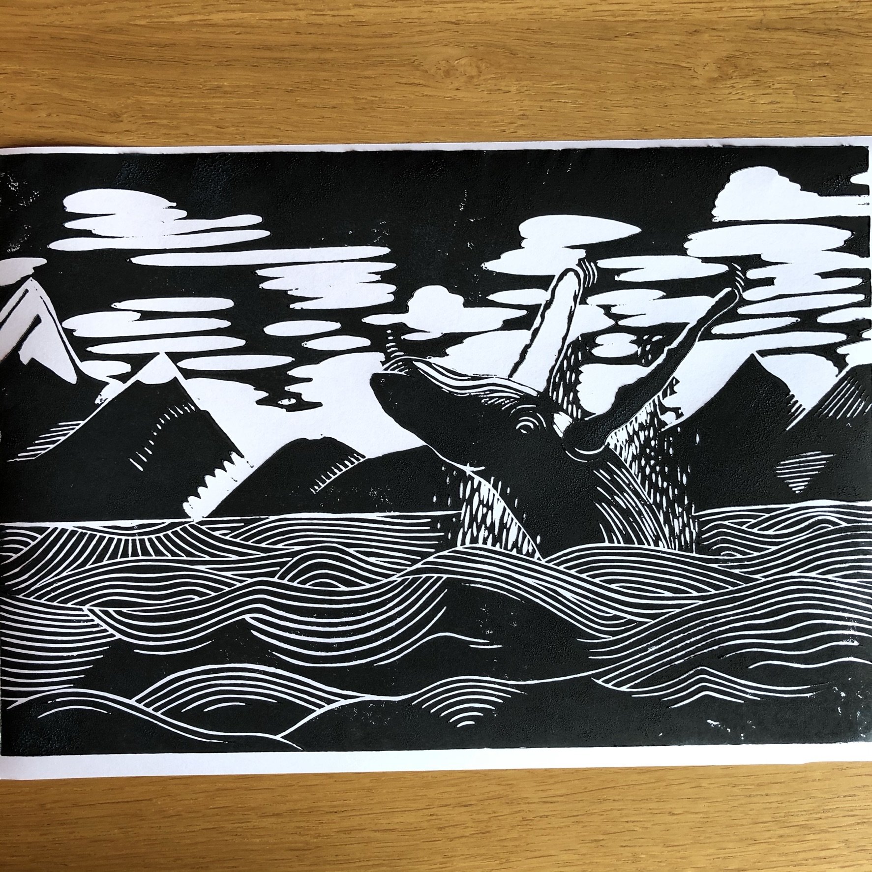 Black and white illustration of a person standing on mountains, with clouds or fog in the sky and stylized flowing lines representing water or wind below.