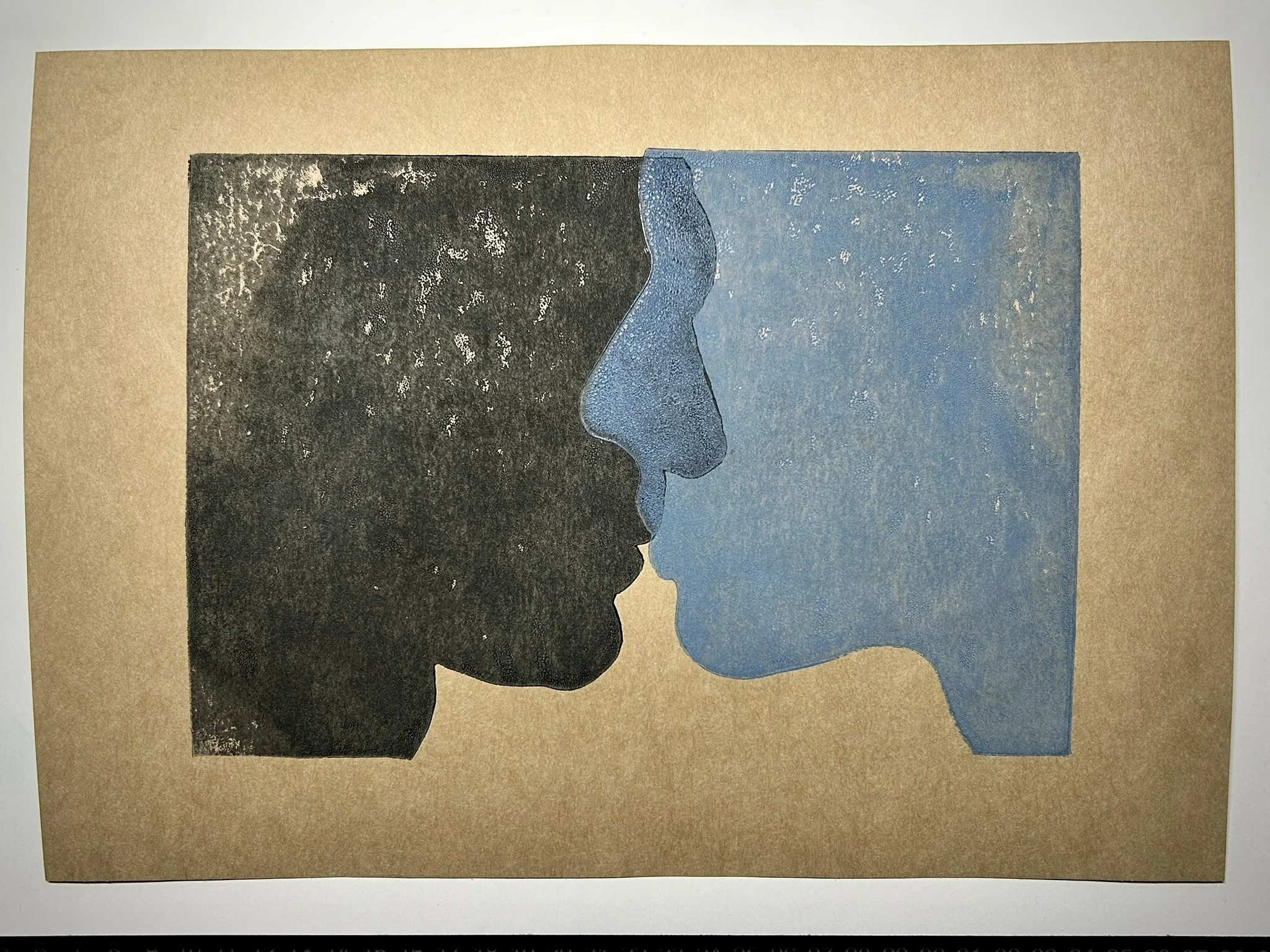 Two overlapping silhouette profiles of a person's face, one in black and one in blue, on a beige background.
