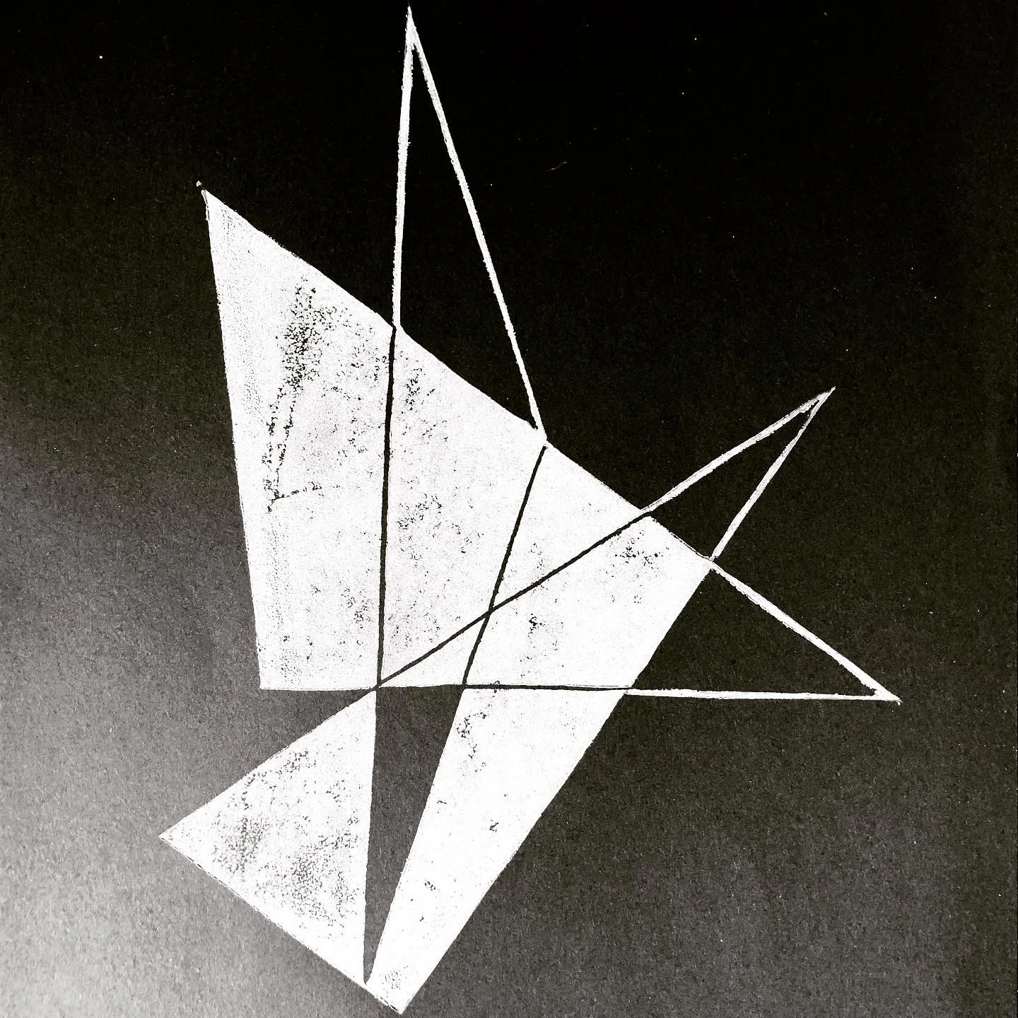 Black and white abstract geometric artwork featuring various triangles and lines.