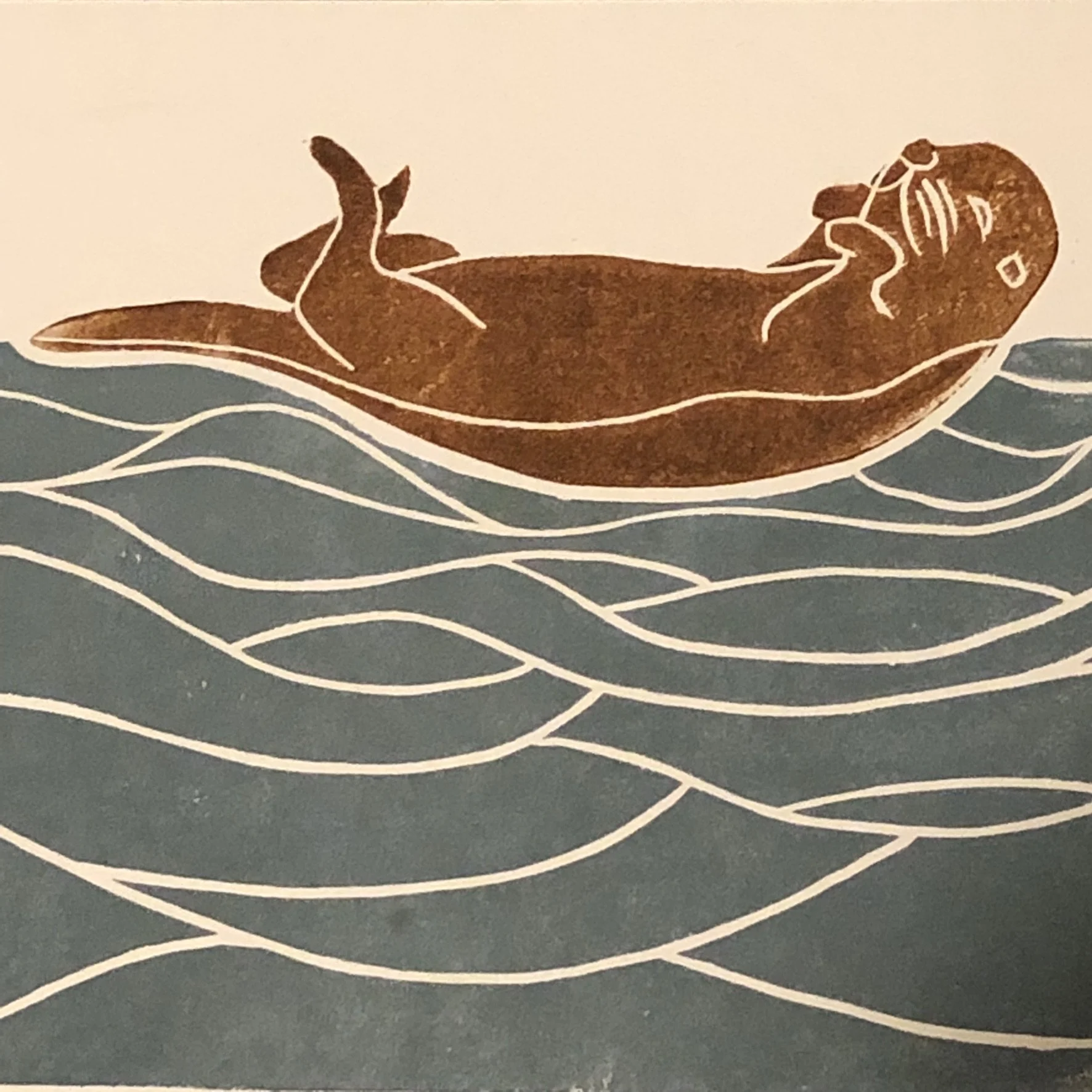 Illustration of a reclining female figure with long flowing hair, resting on waves, depicted in a stylized, abstract manner with brown lines on a light background and blue waves outlined in white.