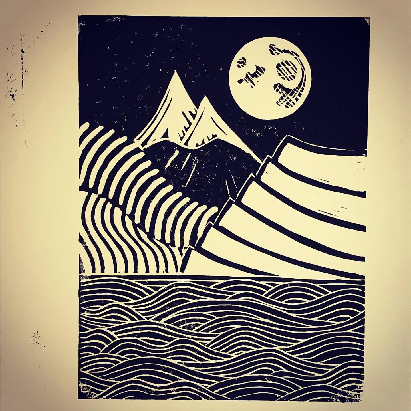 Black and white abstract art featuring a mountain range, a large full moon with a smiley face and the American flag background, and stylized wavy lines at the bottom.