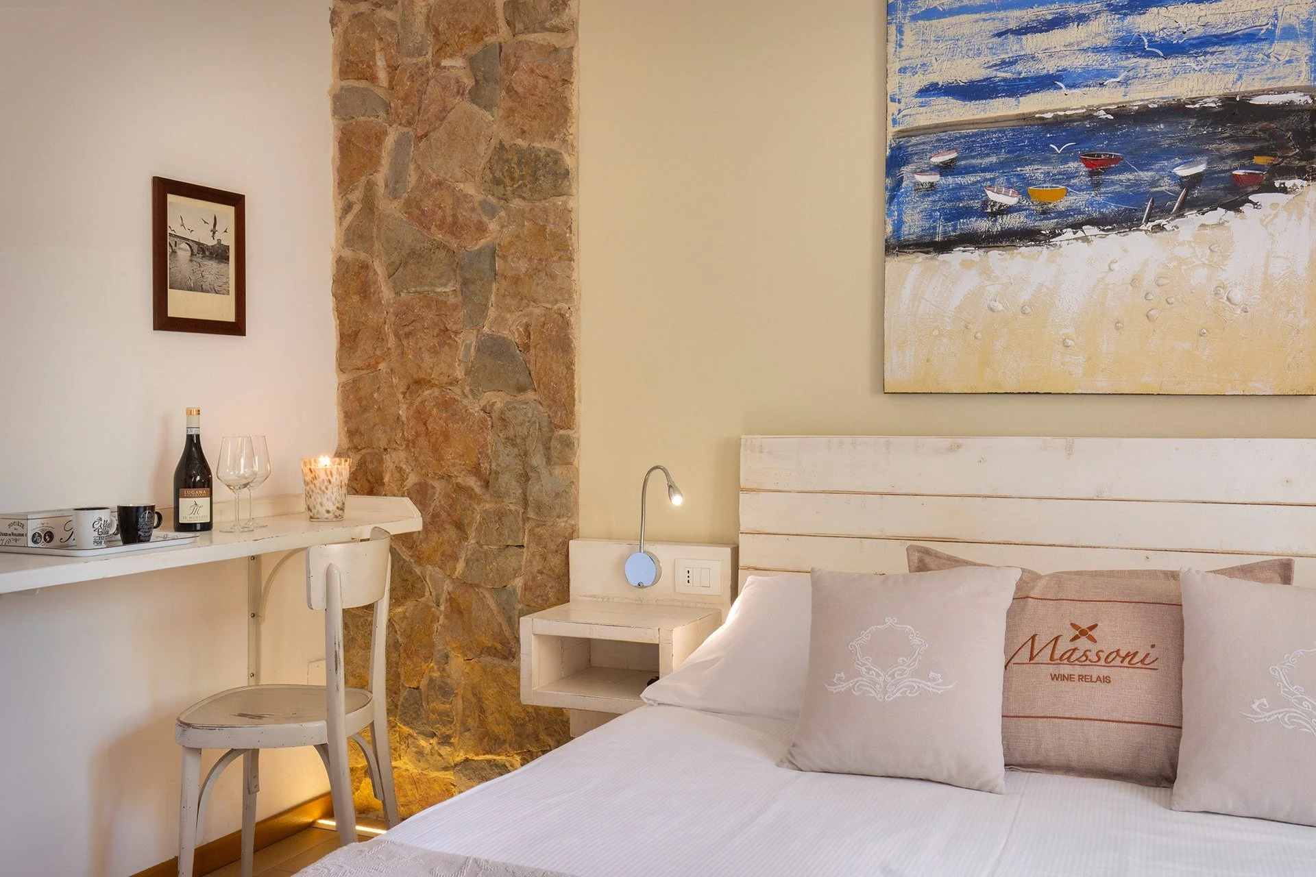 Double room with exposed stone wall
