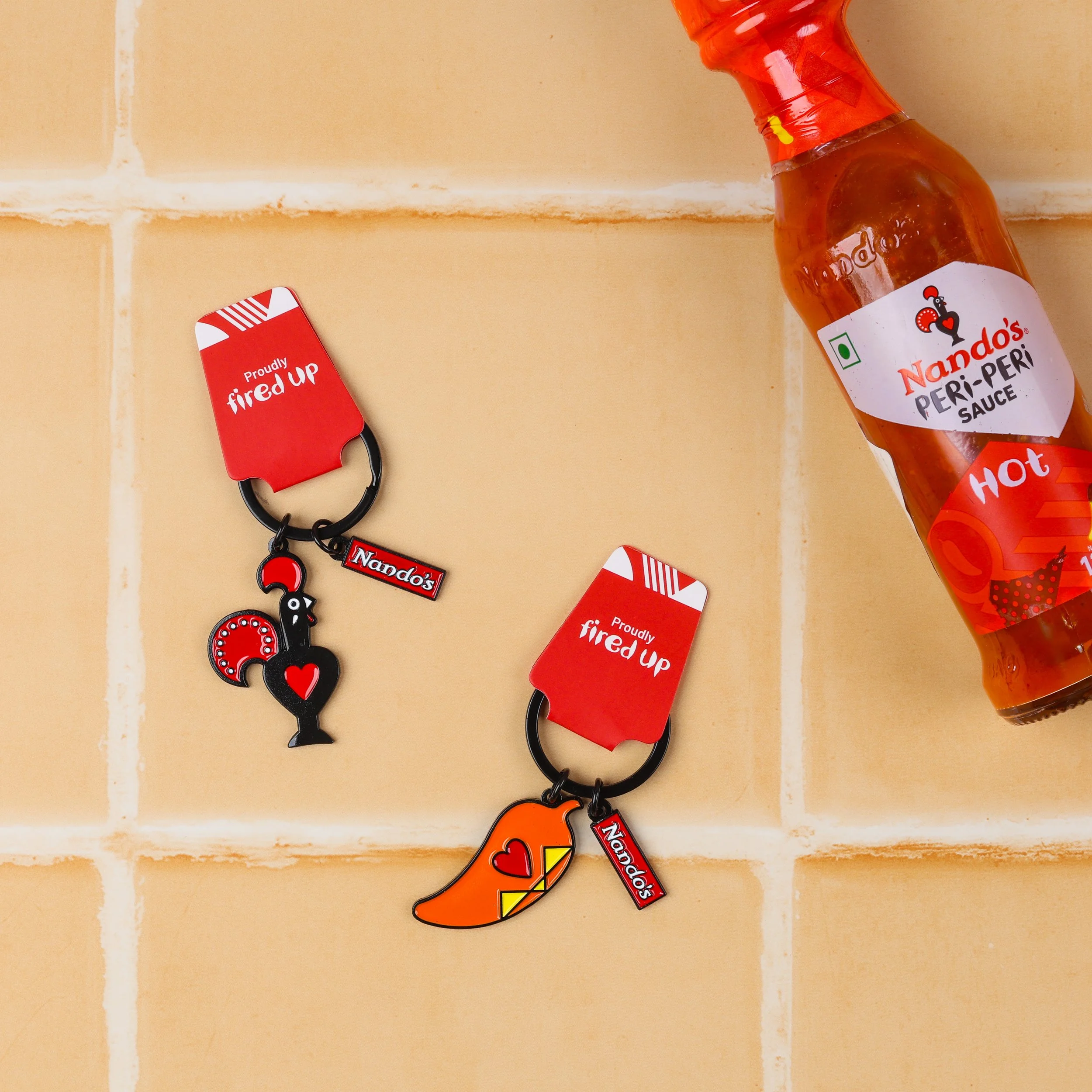 enamel-keychain-nandos-peri-peri-rooster-chilli.jpg