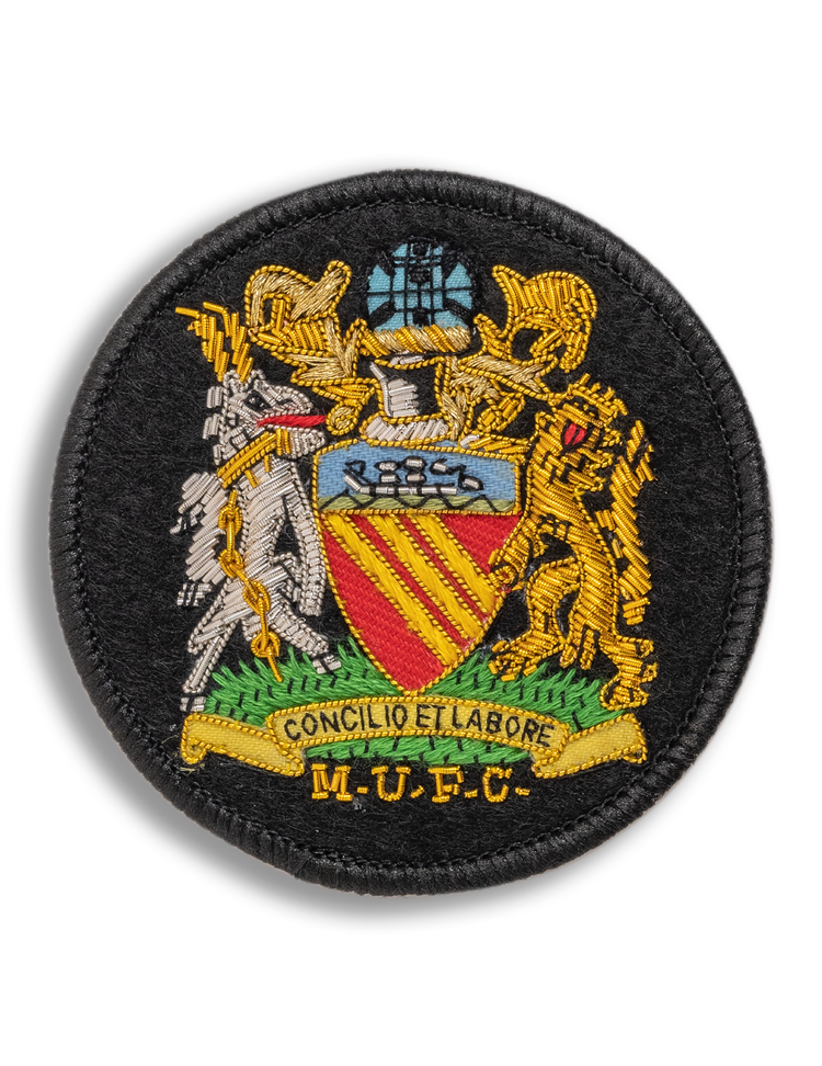 Handmade bullion patch worked in gold and silver wire on a fabric base, used for club and forces emblems