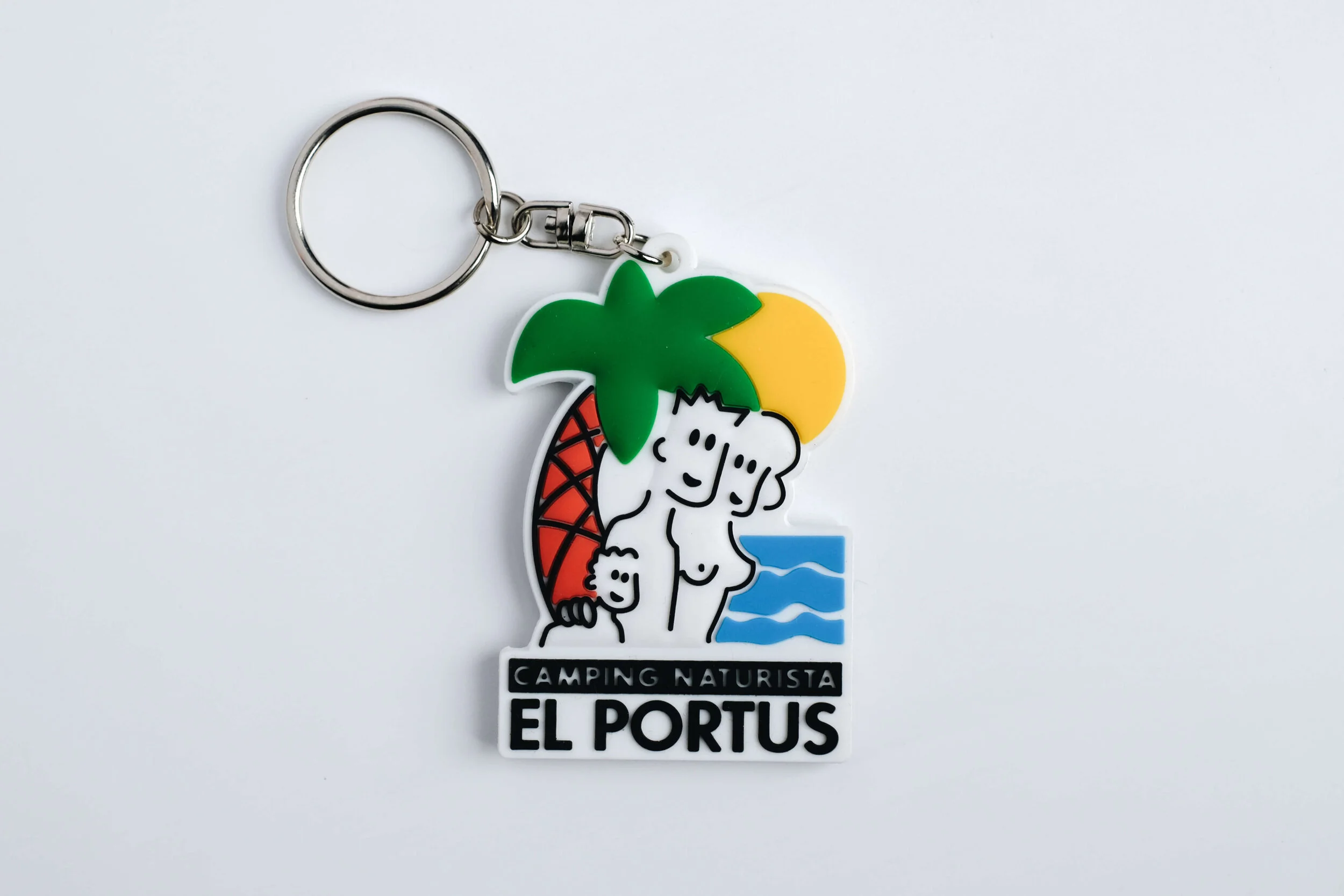 Soft PVC keychain moulded as a palm tree and beach scene